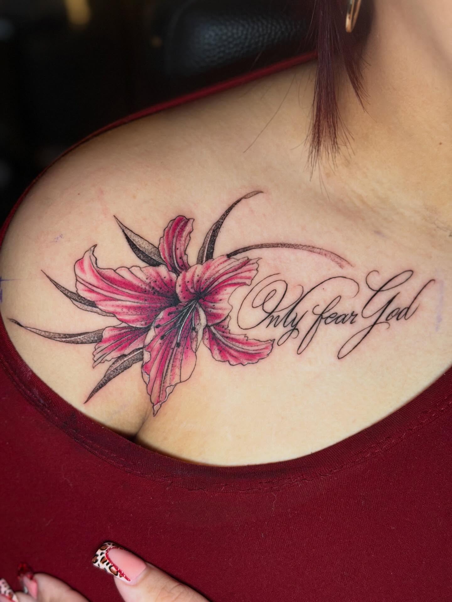 Lily realism tattoo on the shoulder by Dany