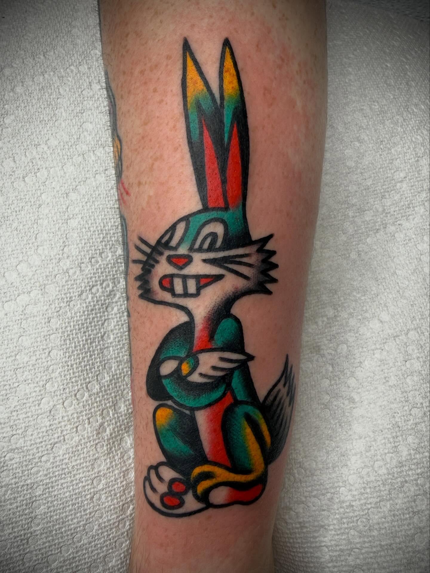 Looney tunes rabbit American traditional tattoo on the forearm by Tristan Bradshaw