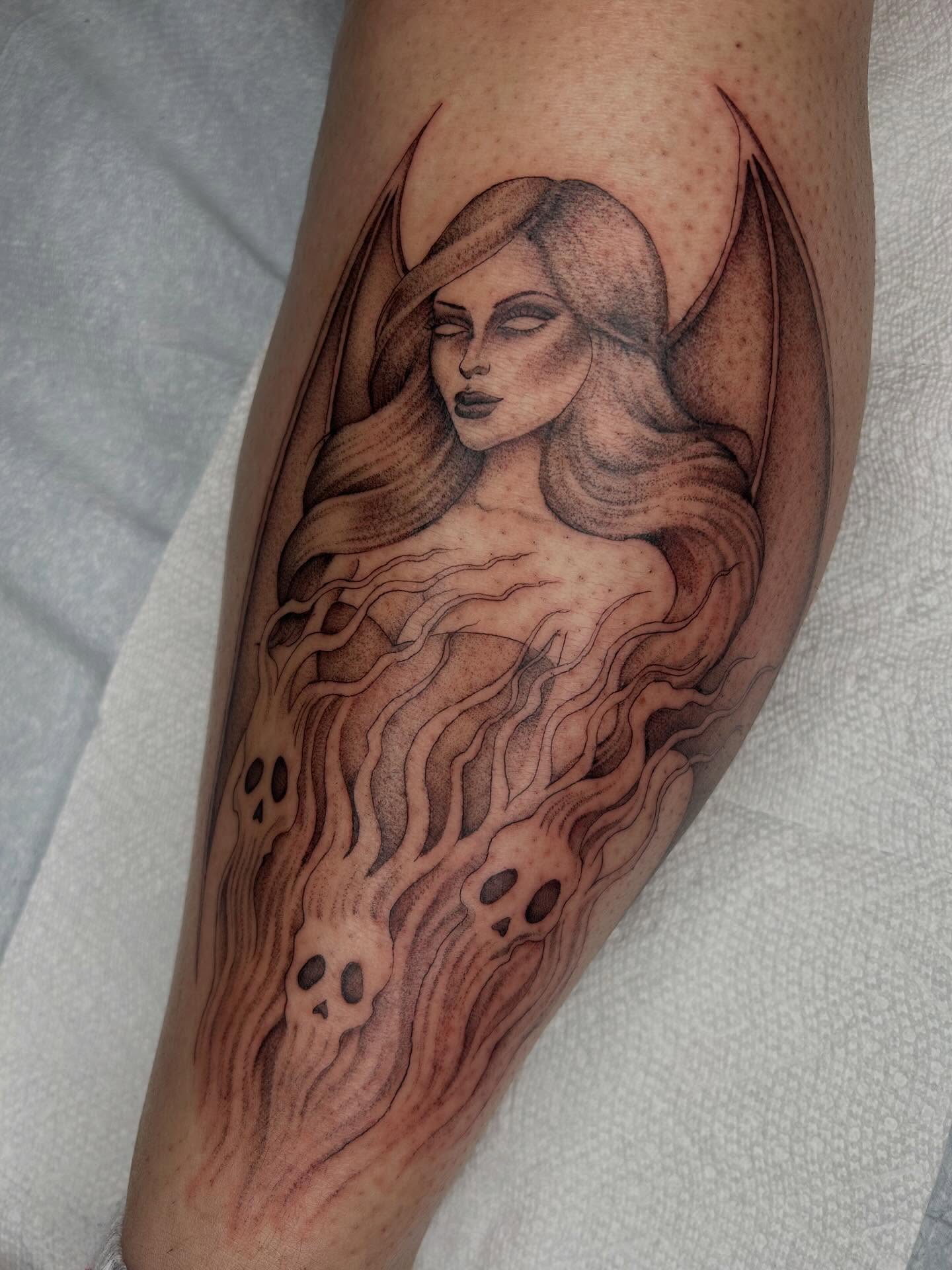Woman with flowing hair realism tattoo on the forearm by Olivia Fox