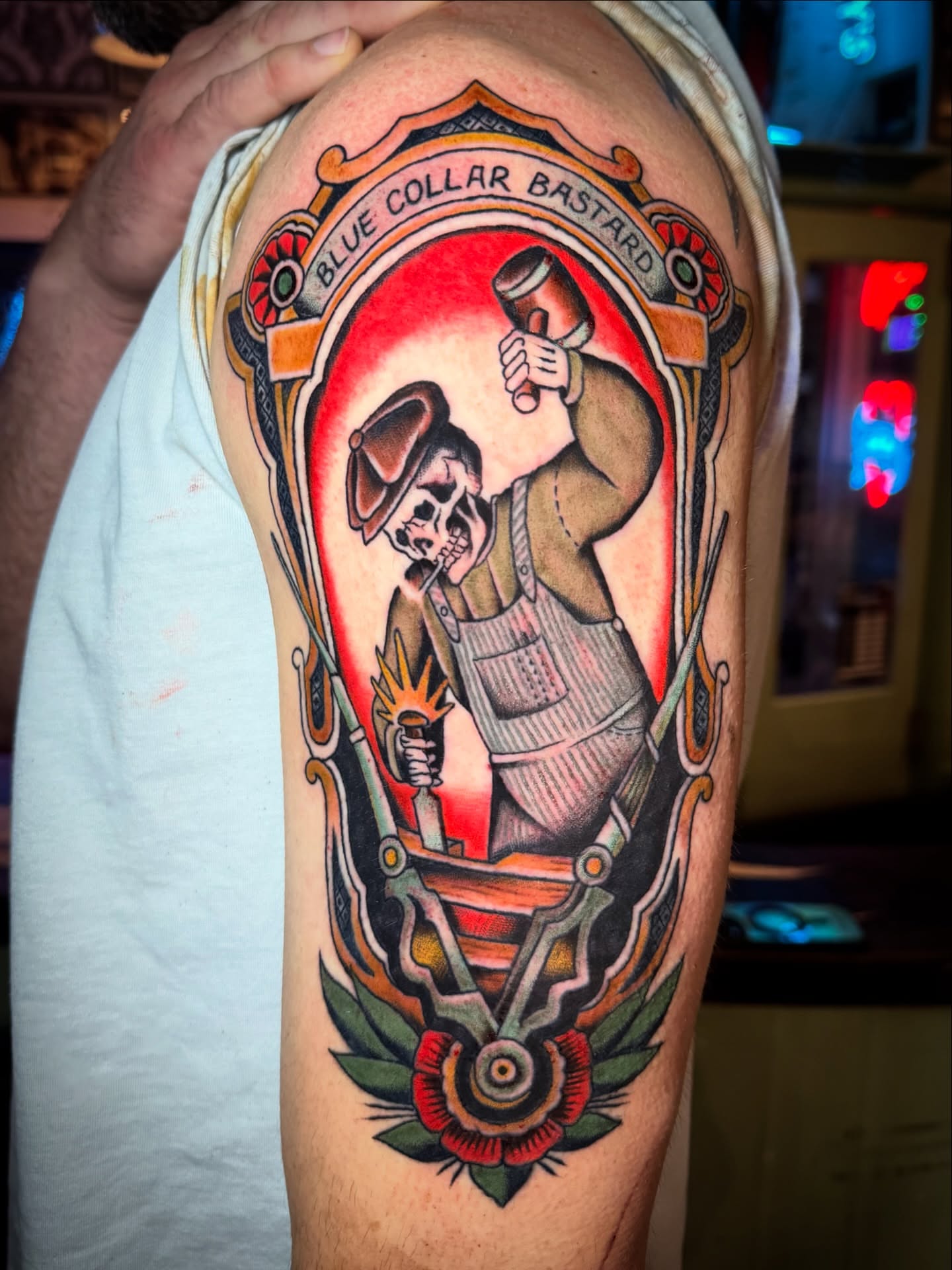 Blue collar bastard American traditional tattoo on the shoulder by Pavel