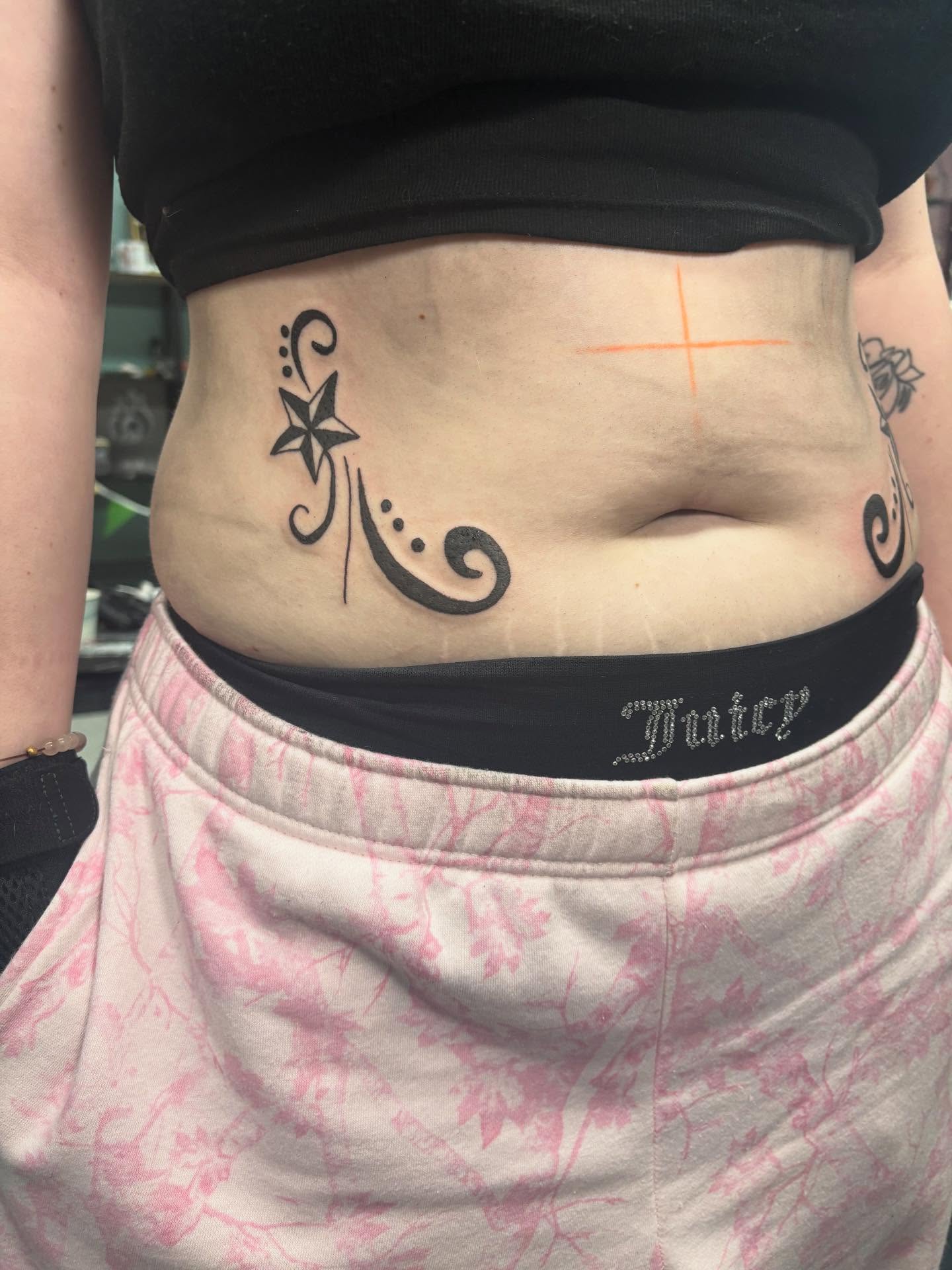Star and swirls tribal tattoo on the torso by Joe ⋆₊⋆☢︎⁺₊⚠︎₊⋆