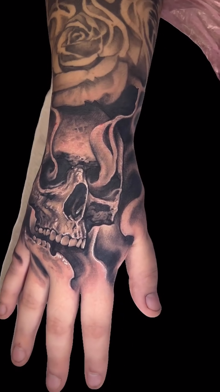 Skull and rose dark realism tattoo by Daniel Fisher, Berlin, New Jersey