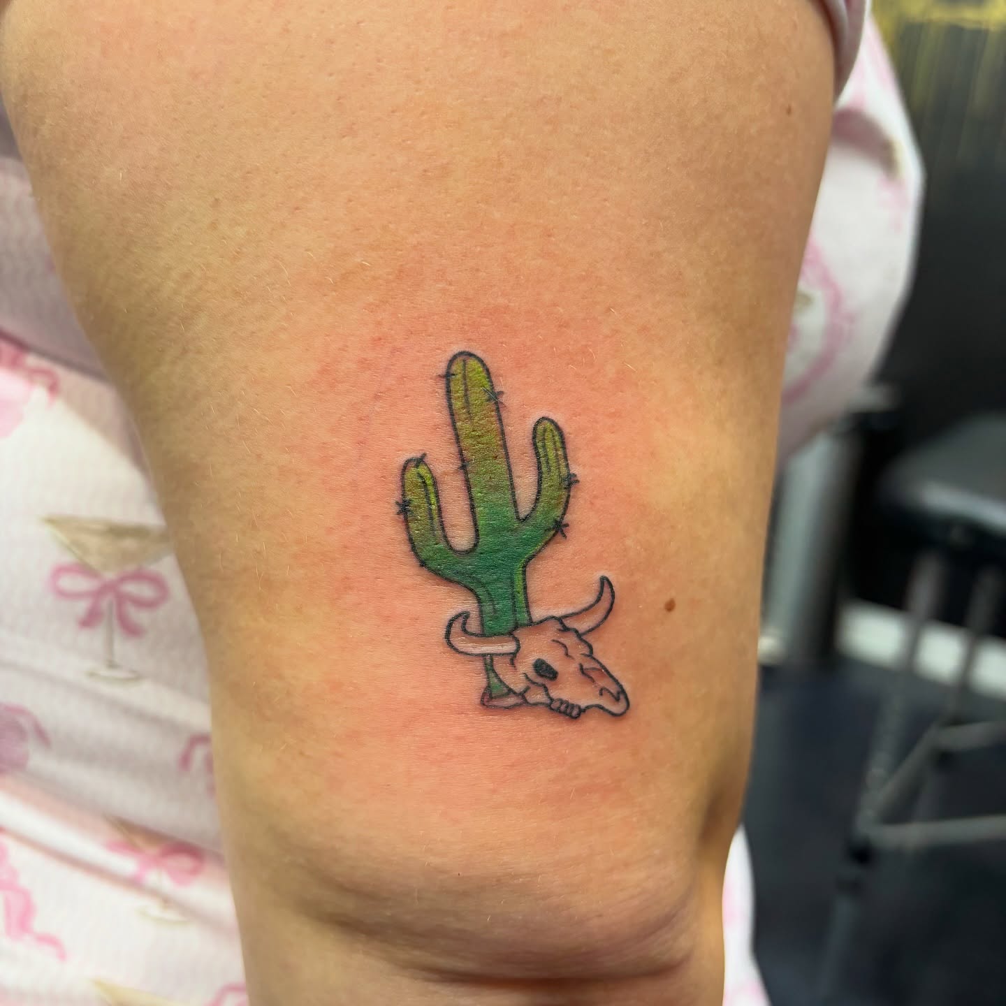 Cactus with bull skull Chicano tattoo on the forearm by Shiann Null