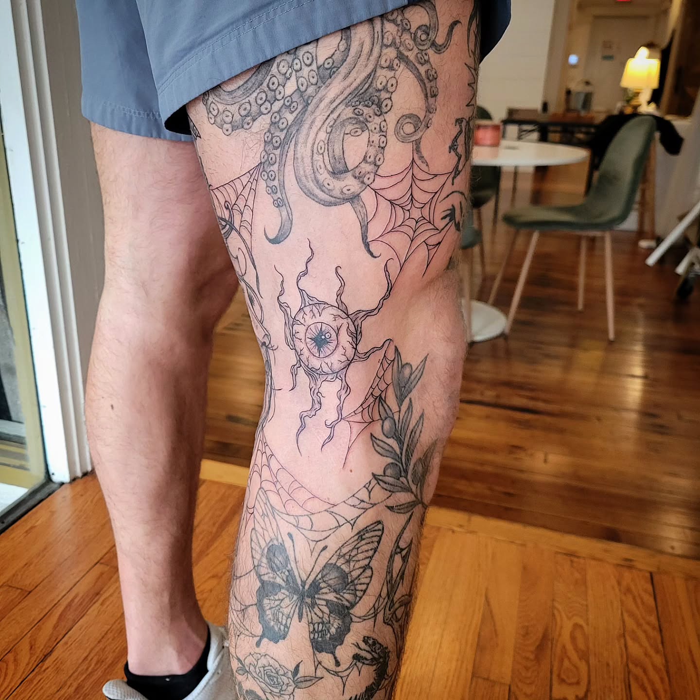 Octopus and spider web black and grey tattoo on the thigh by Solstice Tattoos by Savannah Sadler (future, Salisbury, North Carolina