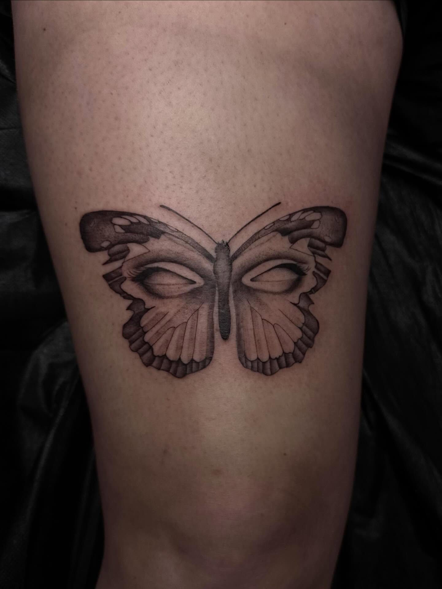 Butterfly black and grey tattoo on the forearm by Madison Jasso