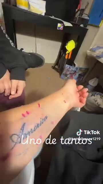 America text tattoo tattoo on the forearm by Annie