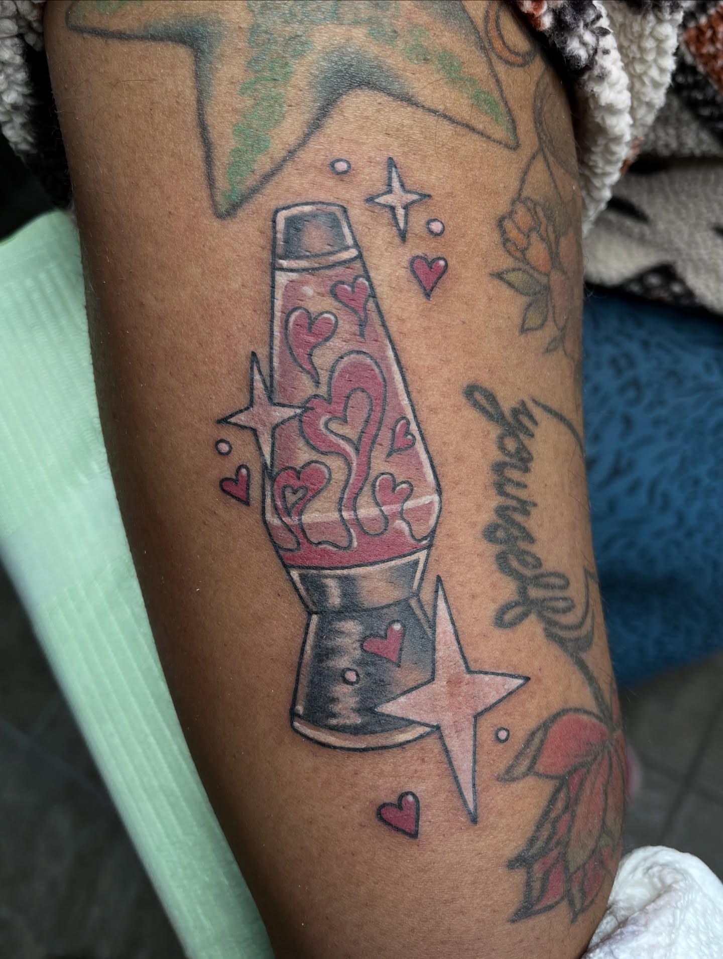 Lava lamp new school tattoo on the forearm by Michigan Tattoo Artist - Nadia Garver, Clinton Township, Michigan