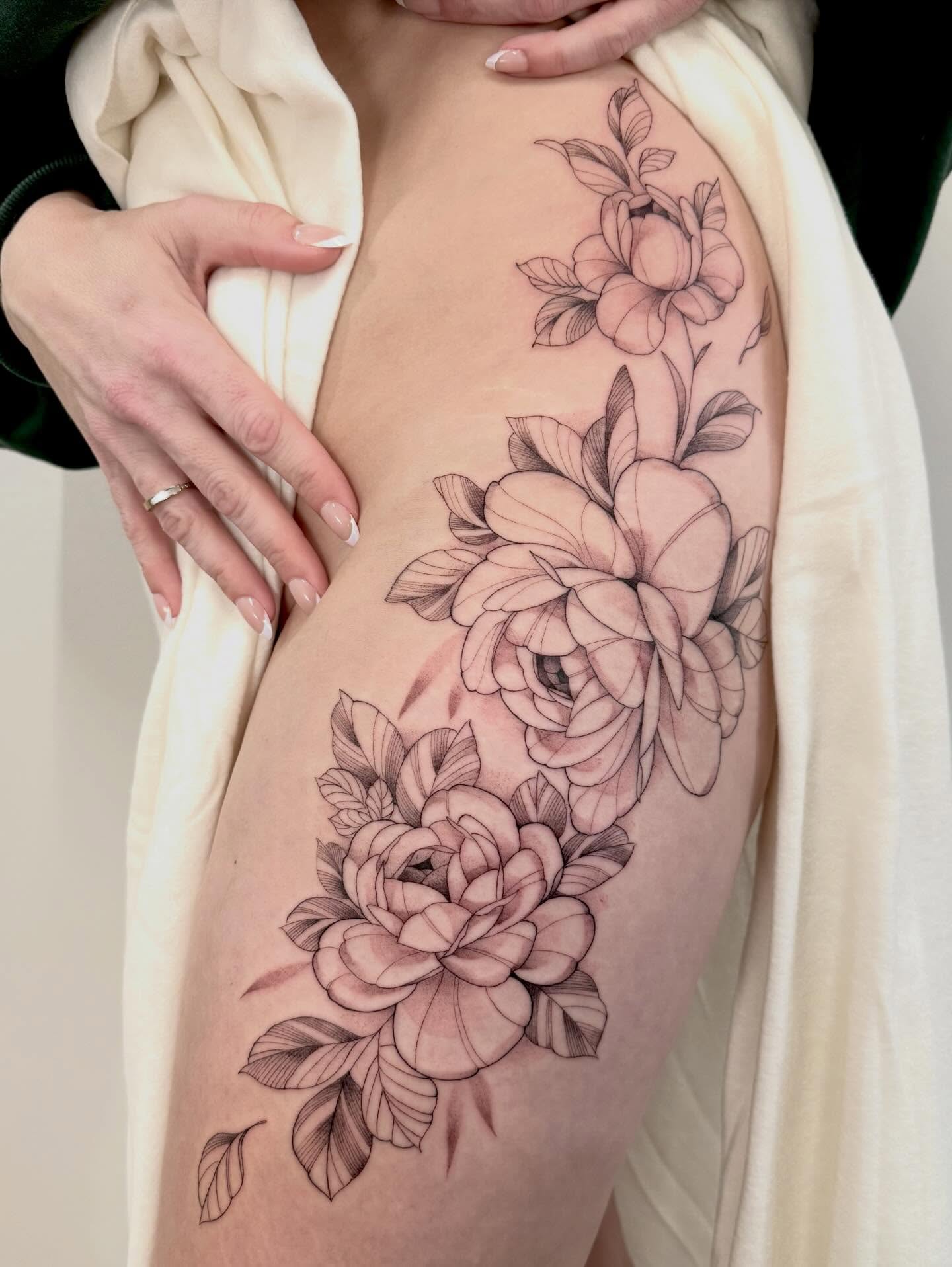 Peony flowers black and grey tattoo on the thigh by Marianna D D King