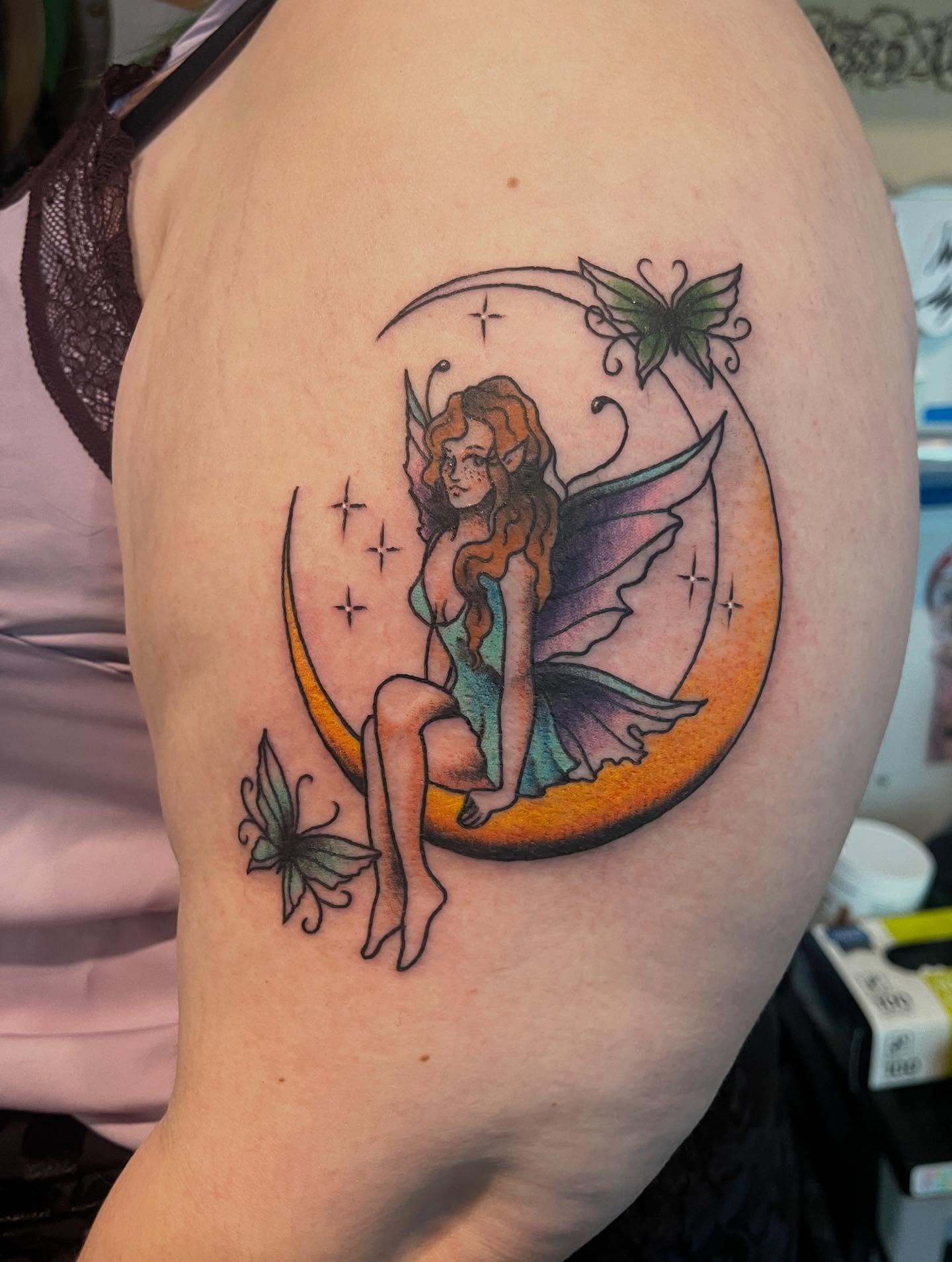 Fairy on crescent moon new school tattoo on the shoulder by 🖤Jess Pereira🖤, Framingham, Massachusetts