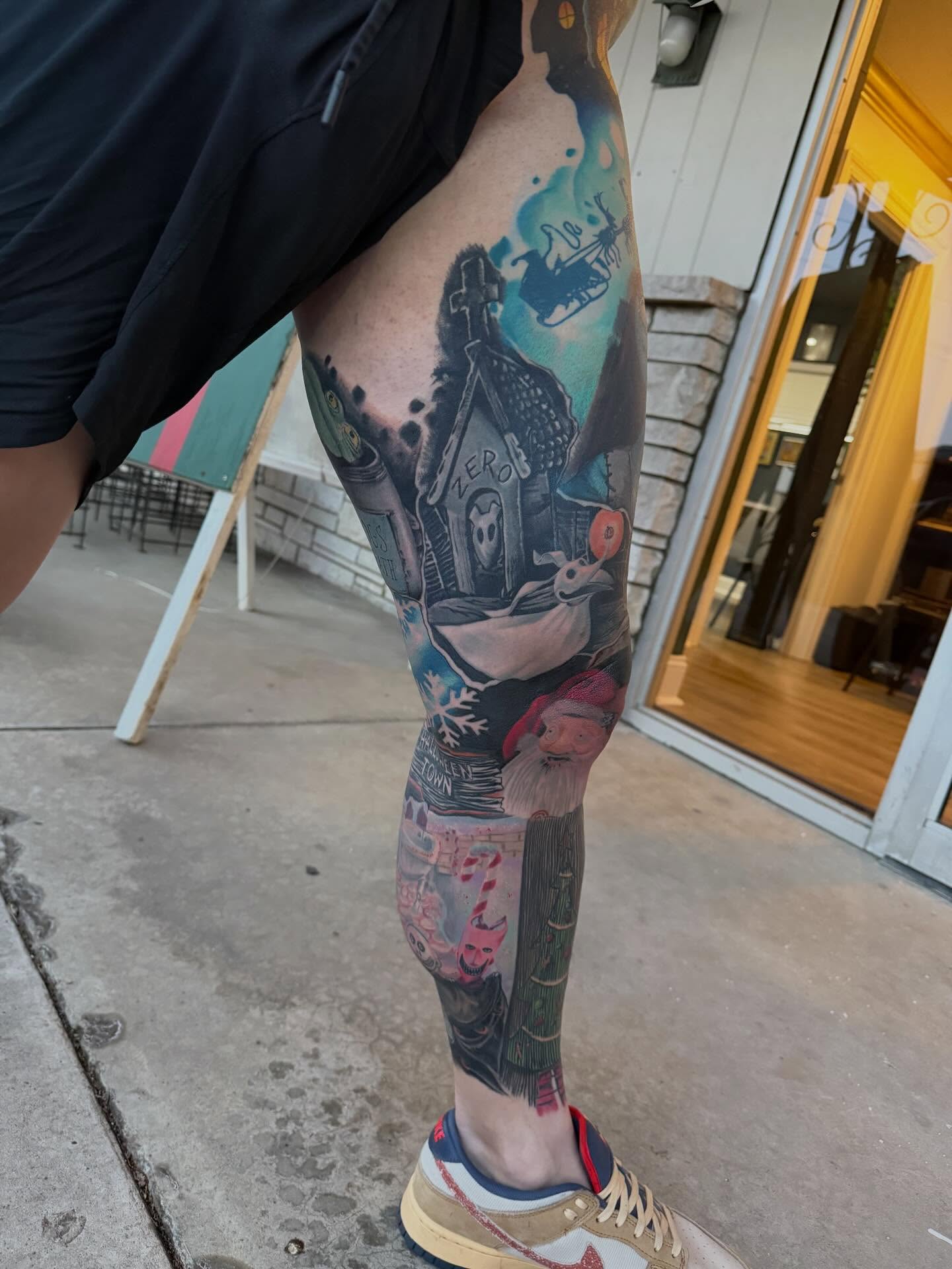 House with ghost American traditional tattoo on the leg by Matthew Gordon