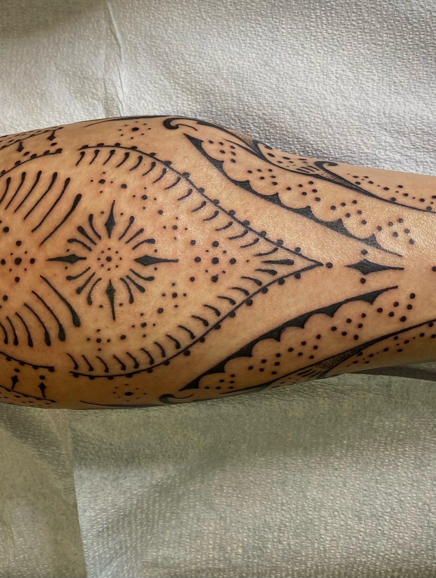 Geometric pattern dotwork tattoo on the forearm by Dave Rodriguez