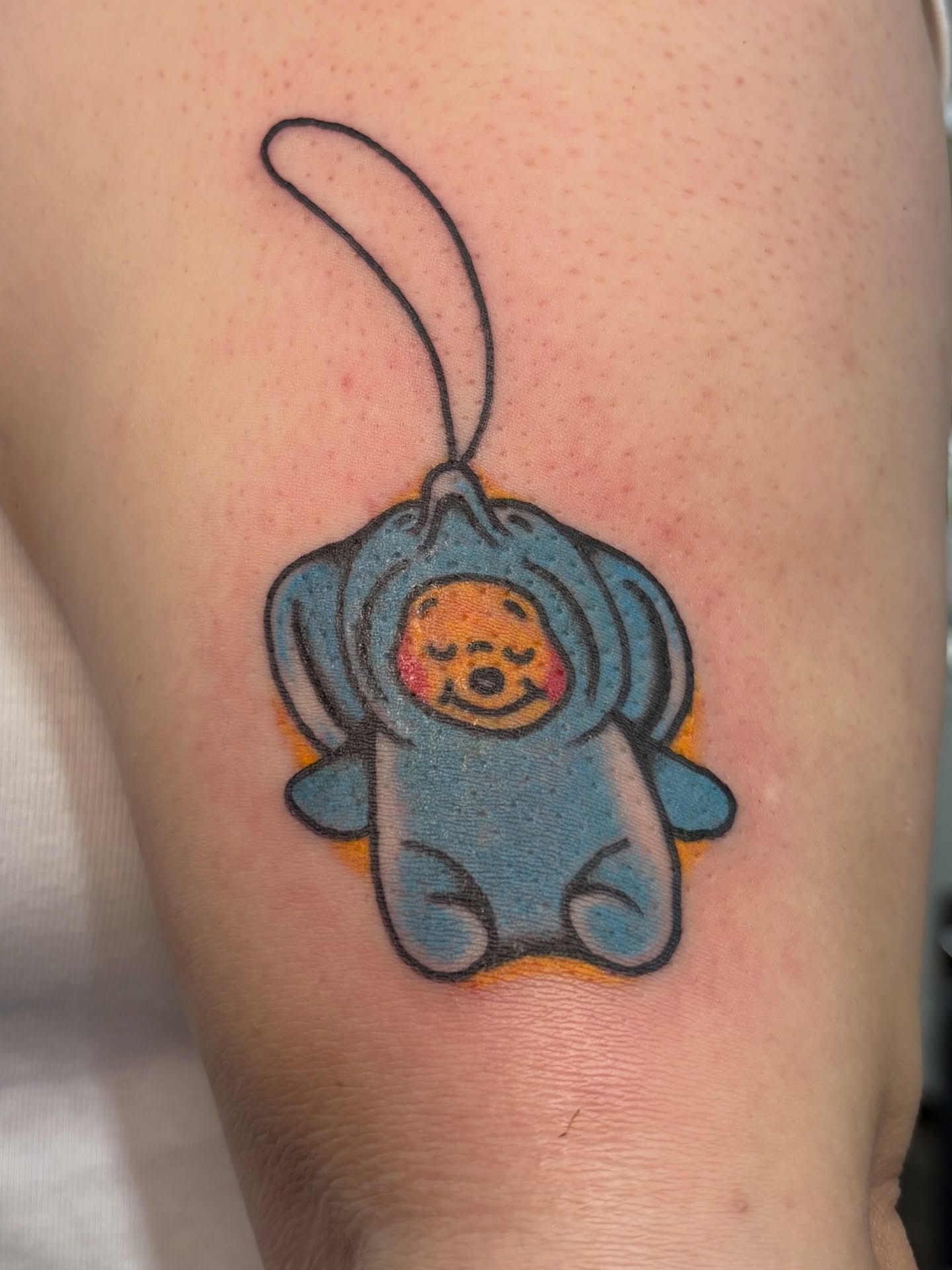 Teddy bear in costume dotwork tattoo on the forearm by Aysia Mankin-Wong, San Francisco, California