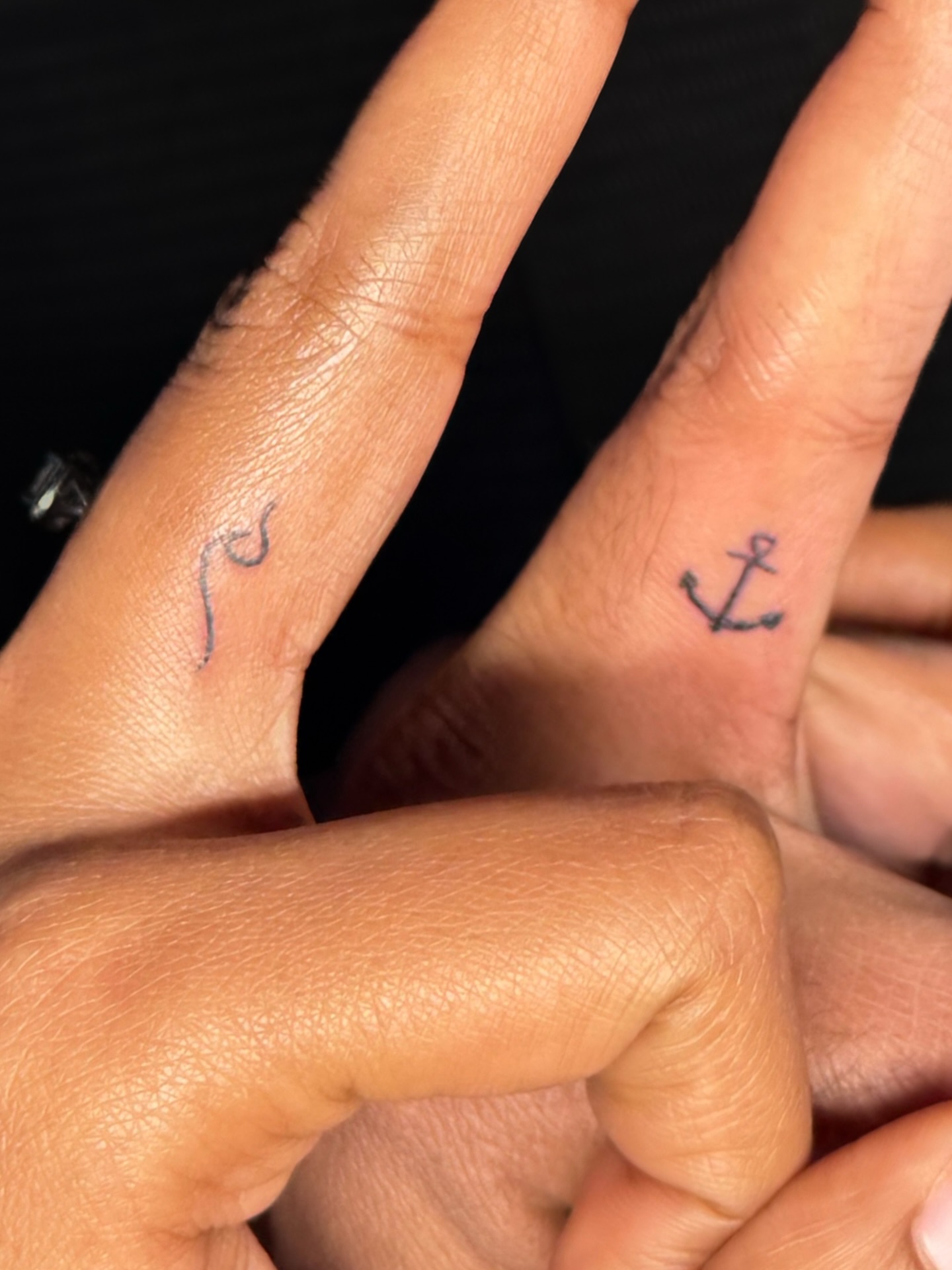 Anchor black and grey tattoo on the hand by Nicole