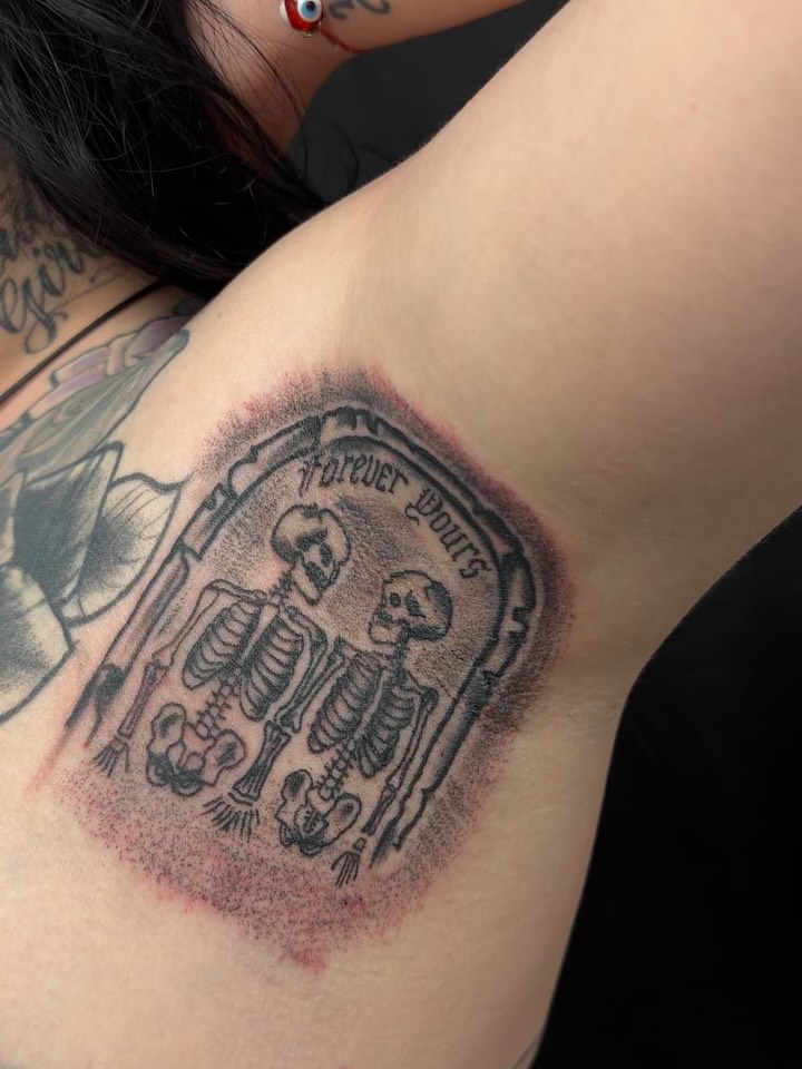 Skeleton couple black and grey tattoo on the shoulder by cortez