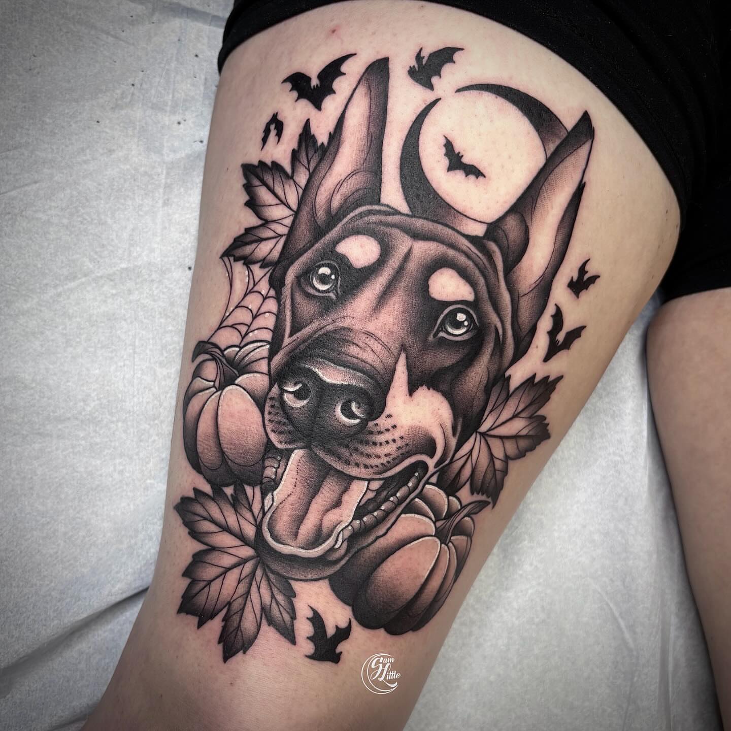 Dog black and grey tattoo on the thigh by 𝓢𝓪𝓶 𝓛𝓲𝓽𝓽𝓵𝓮