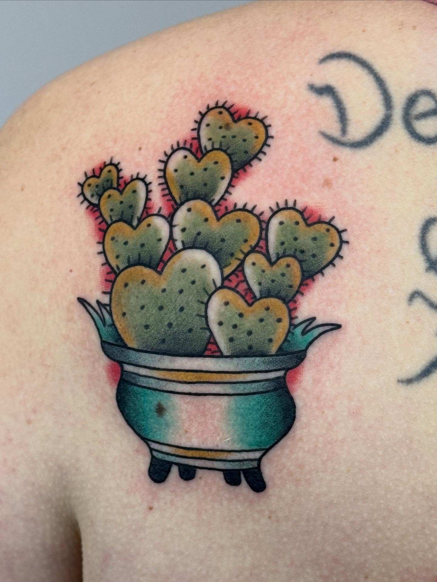 Heart-shaped cactus American traditional tattoo on the shoulder by π©πͺπ¬