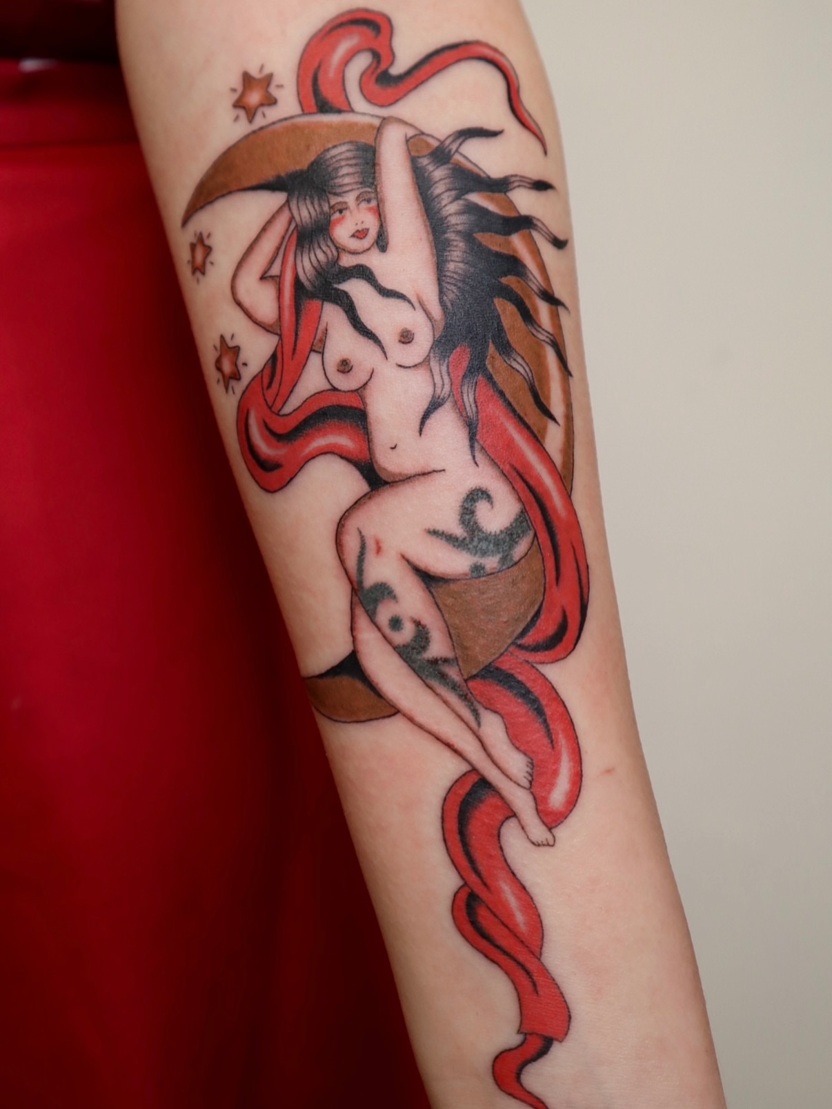 Mermaid American traditional tattoo on the forearm by Kate Ortiz