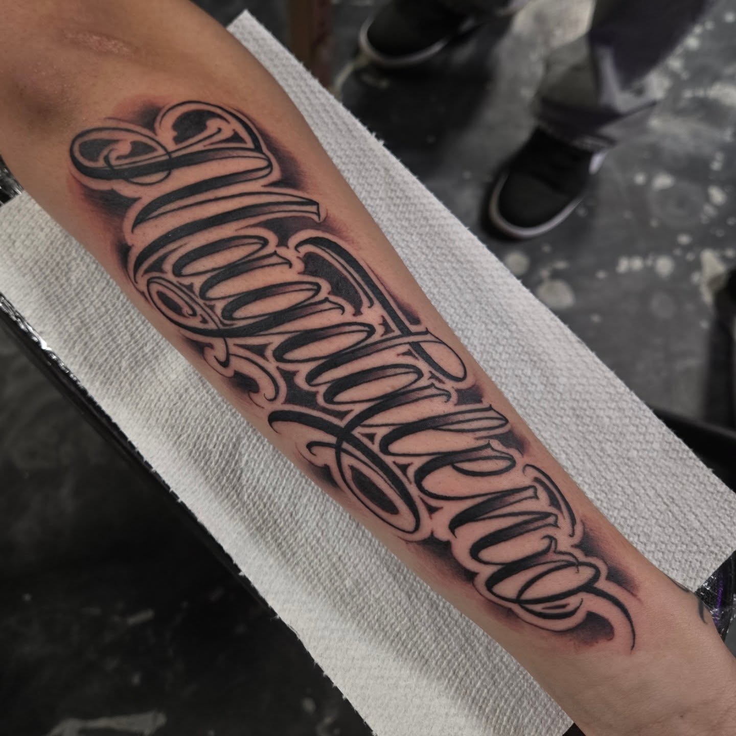 Script lettering lettering script tattoo on the forearm by DiazTattoos, Denver, Colorado