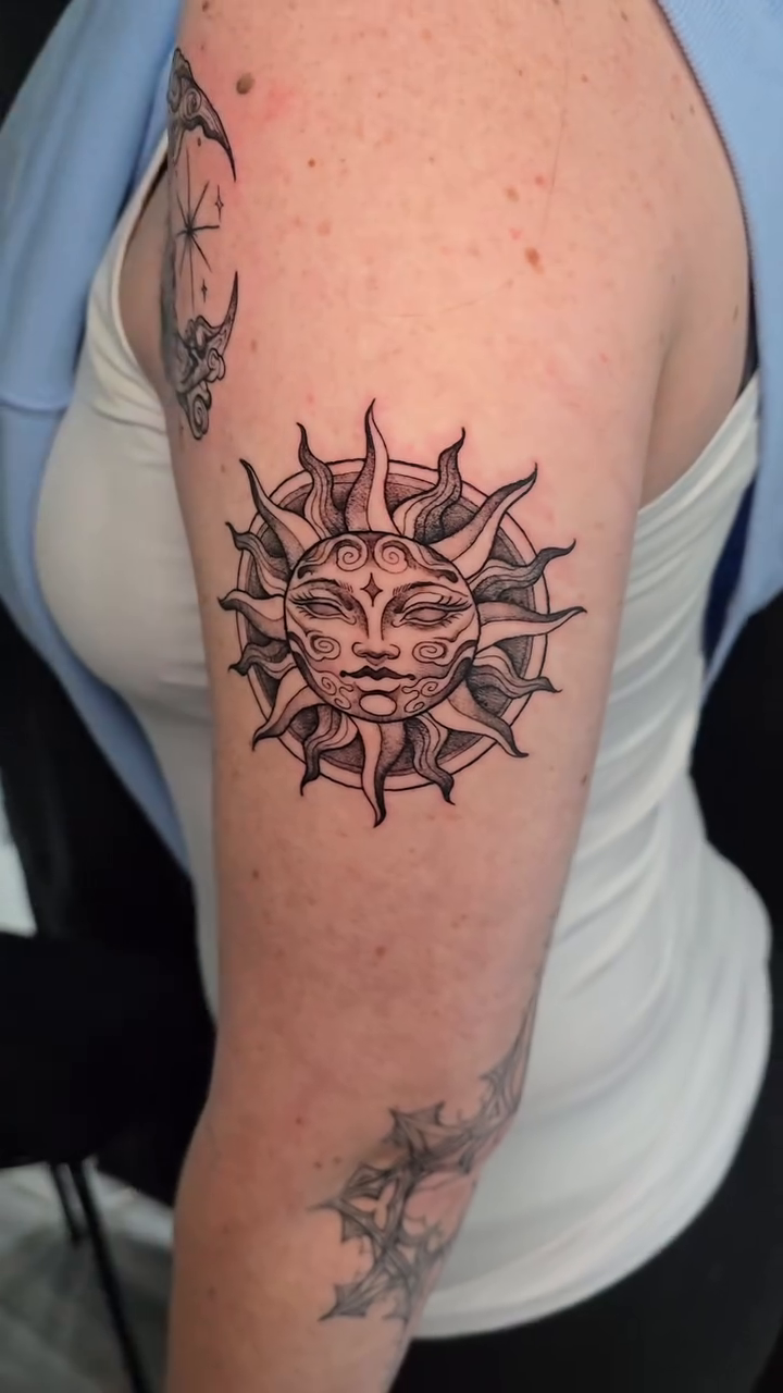 Sun and moon ornamental tattoo by Camuel Whaley