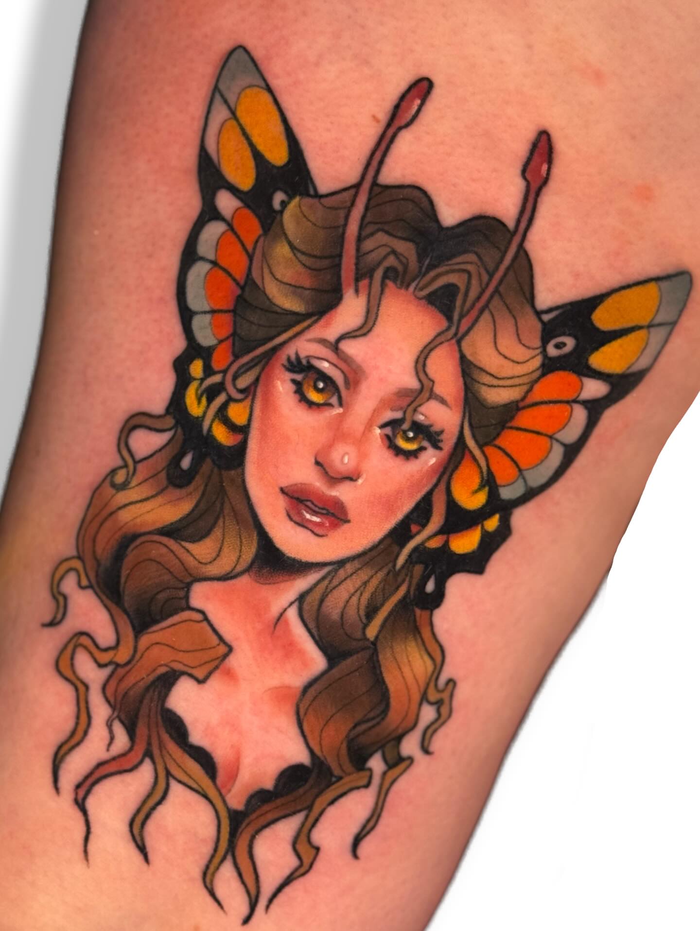 Woman with butterfly wings realism tattoo on the thigh by Ash Sansoucie
