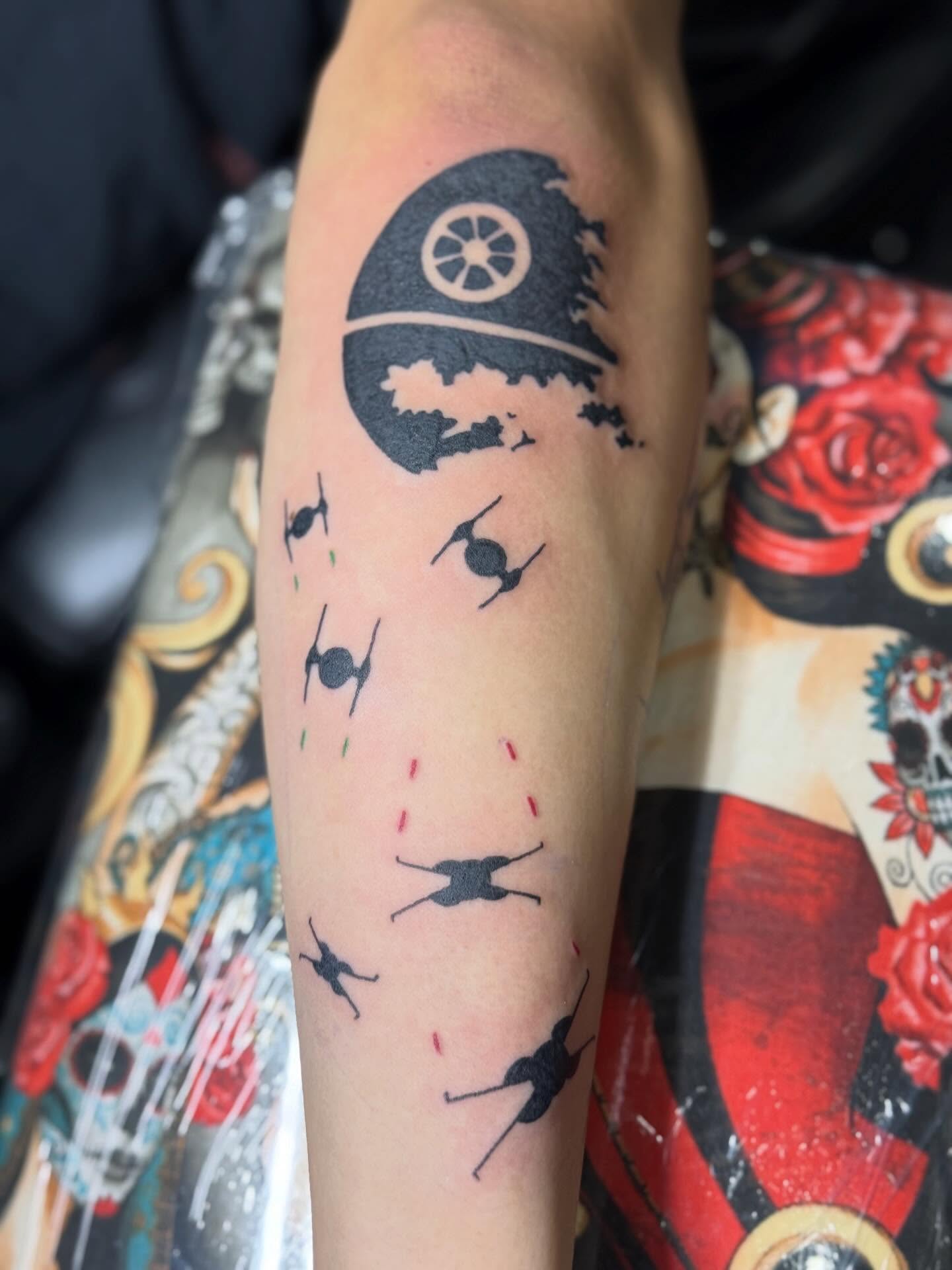 Star wars black and grey tattoo on the forearm by Camryn Justice
