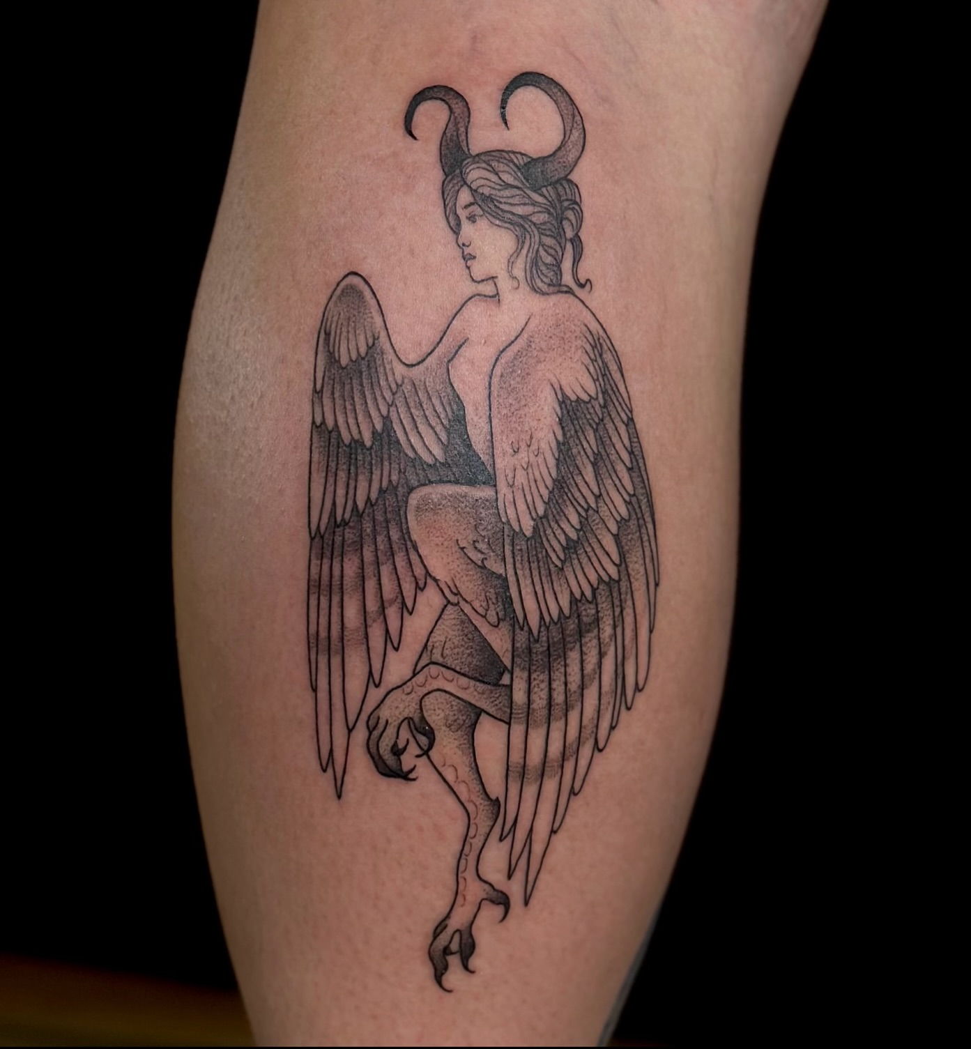 Winged creature dotwork tattoo on the forearm by Zoe Arrigo