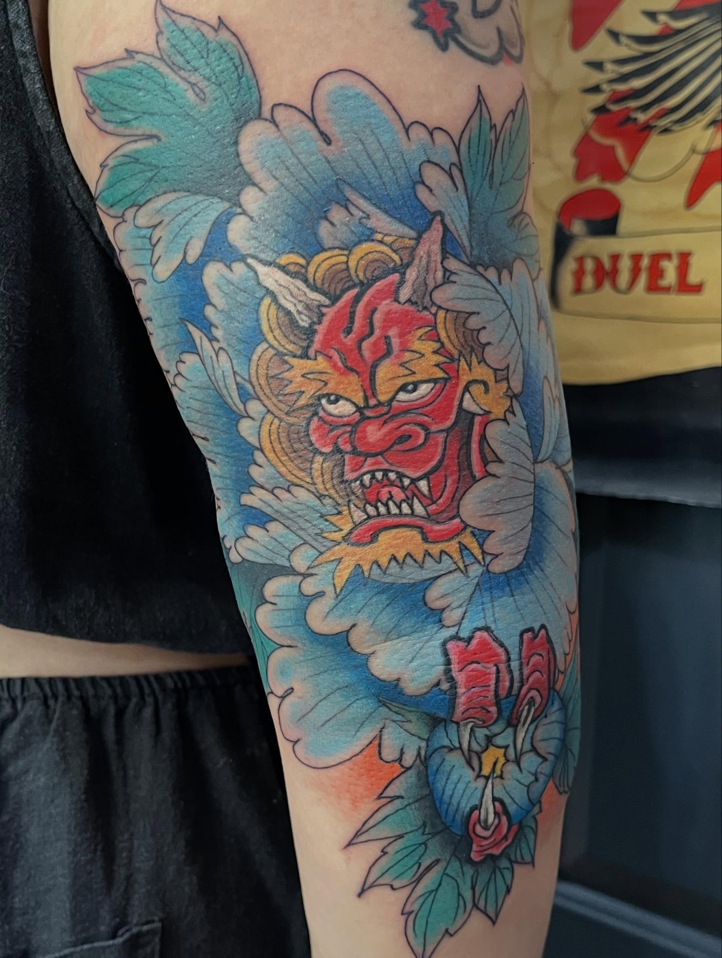 Demon mask American traditional tattoo on the forearm by Miles Maniaci, Chicago, Illinois