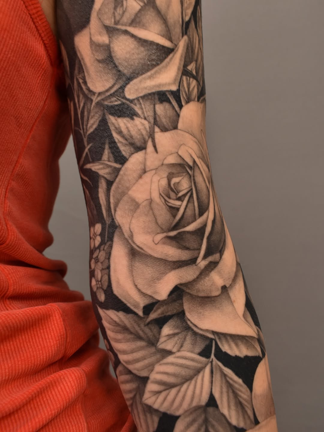 Roses and leaves dotwork tattoo on the forearm by Tattoo Artist