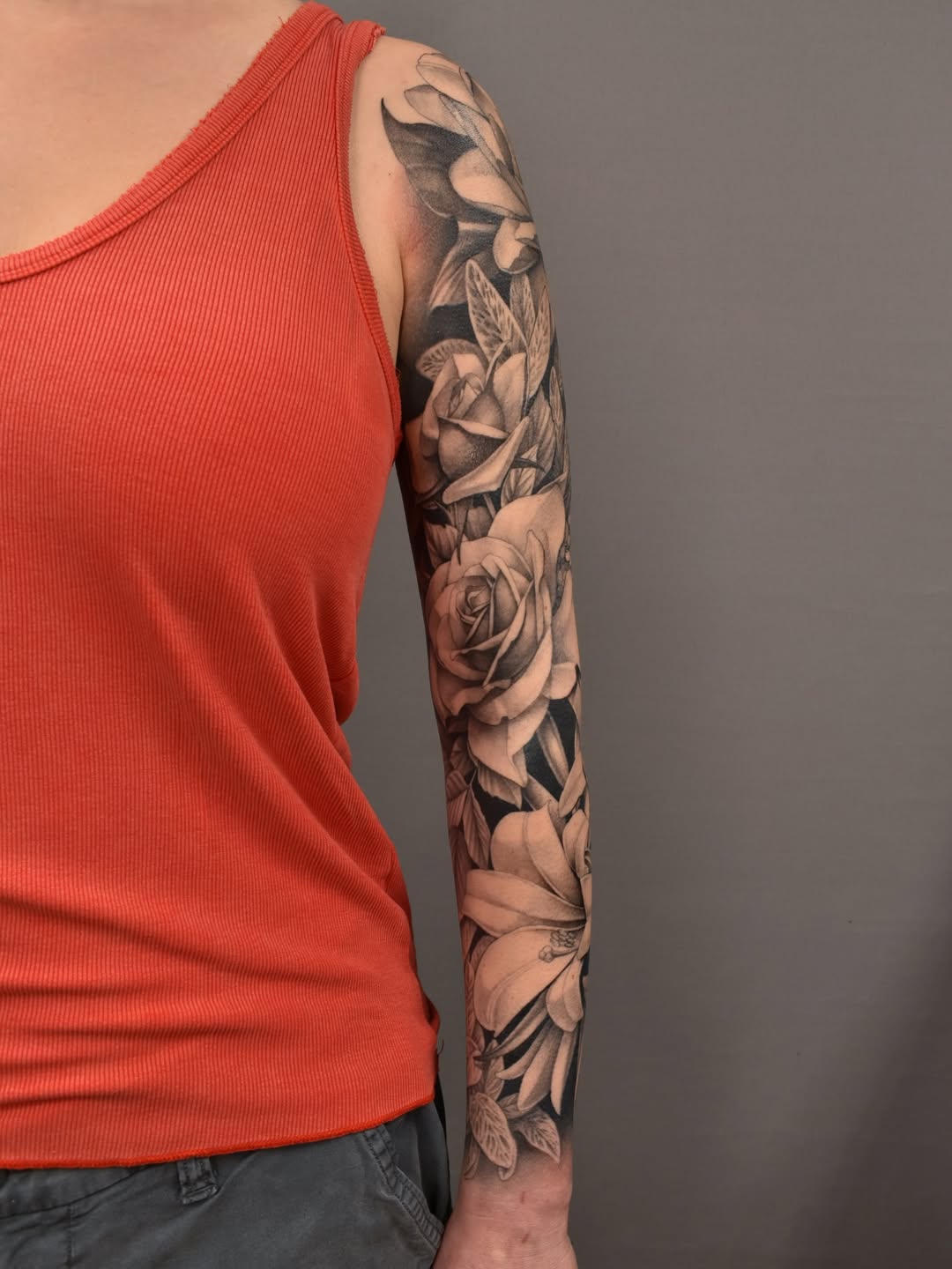Floral sleeve fine line tattoo on the forearm by Tattoo Artist