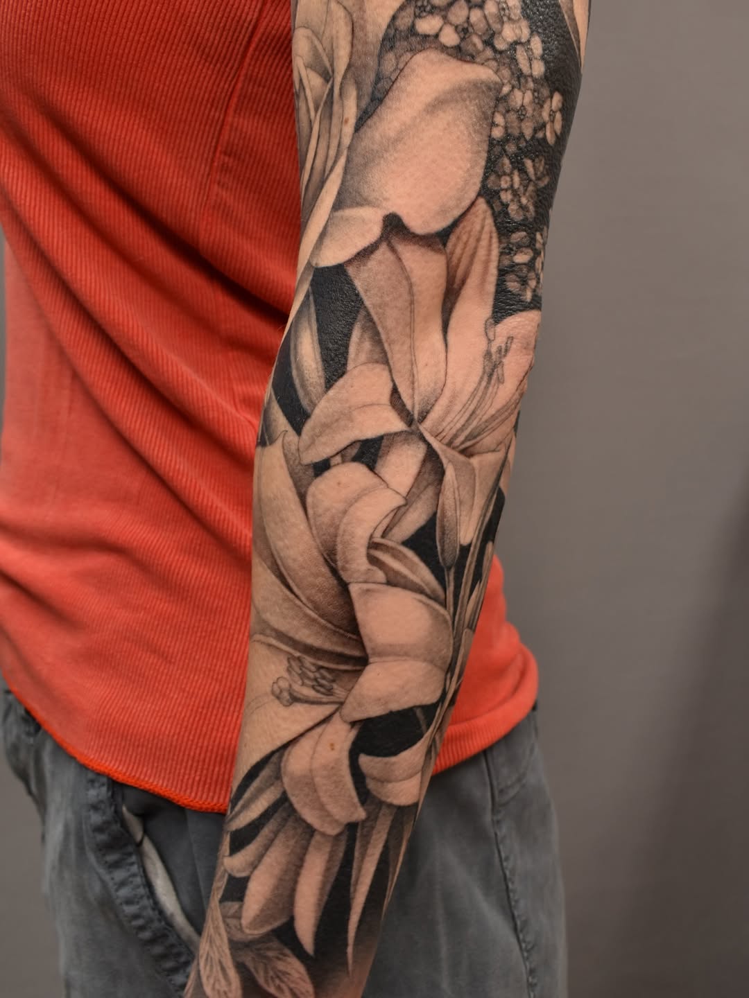 Floral sleeve fine line tattoo on the forearm by Tattoo Artist