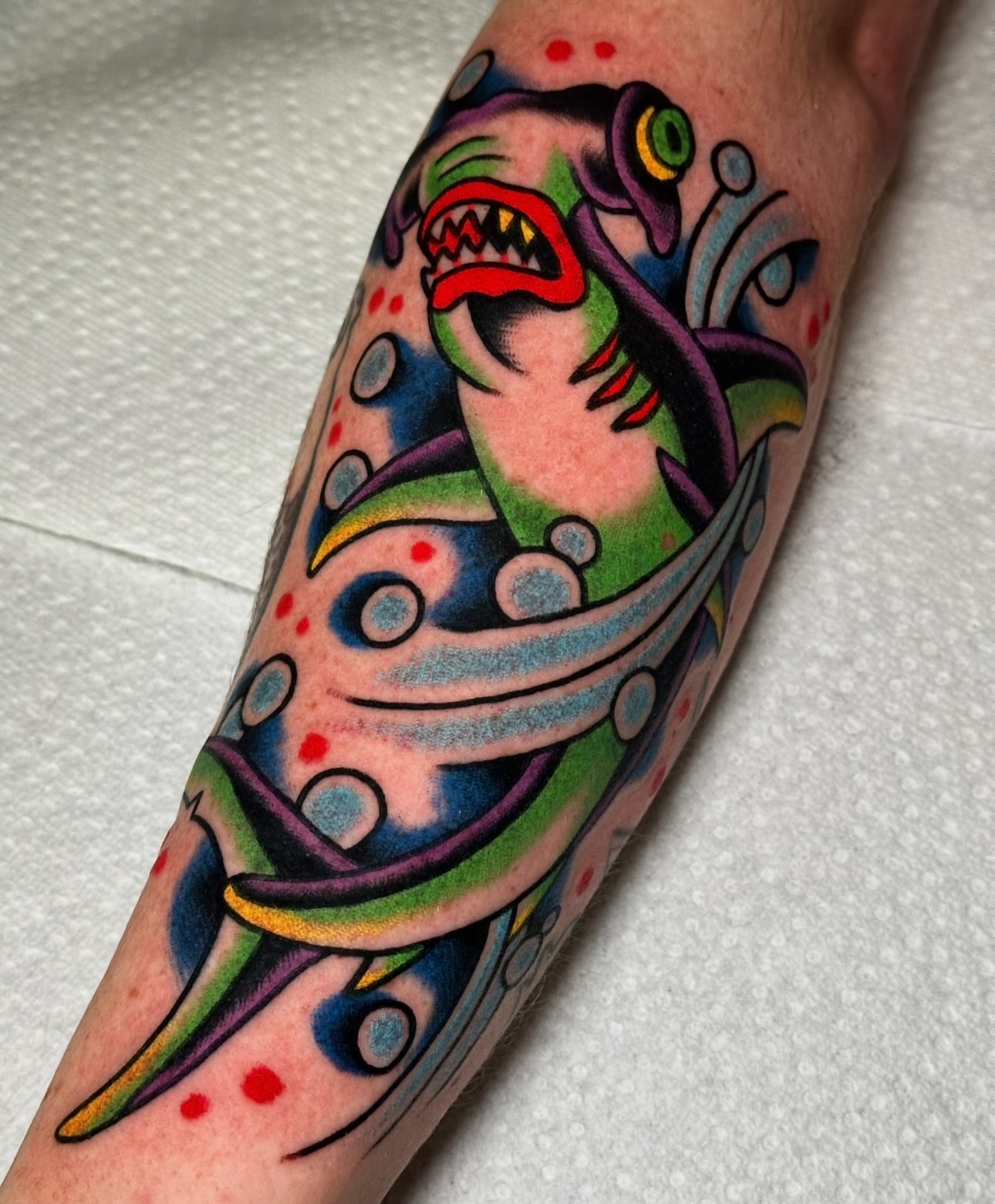 Shark American traditional tattoo on the forearm by Christian Rieben