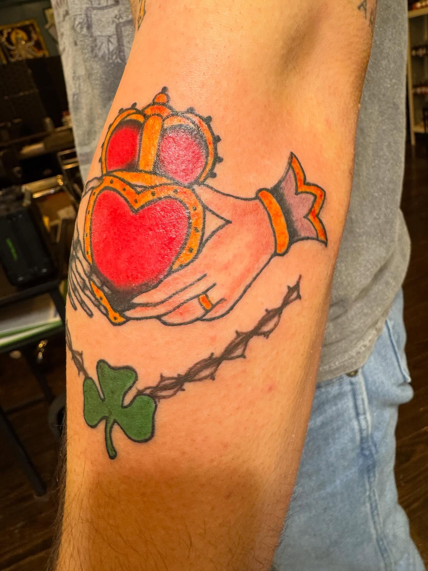 Heart with crown American traditional tattoo on the forearm by Bob Lindell Tattoos