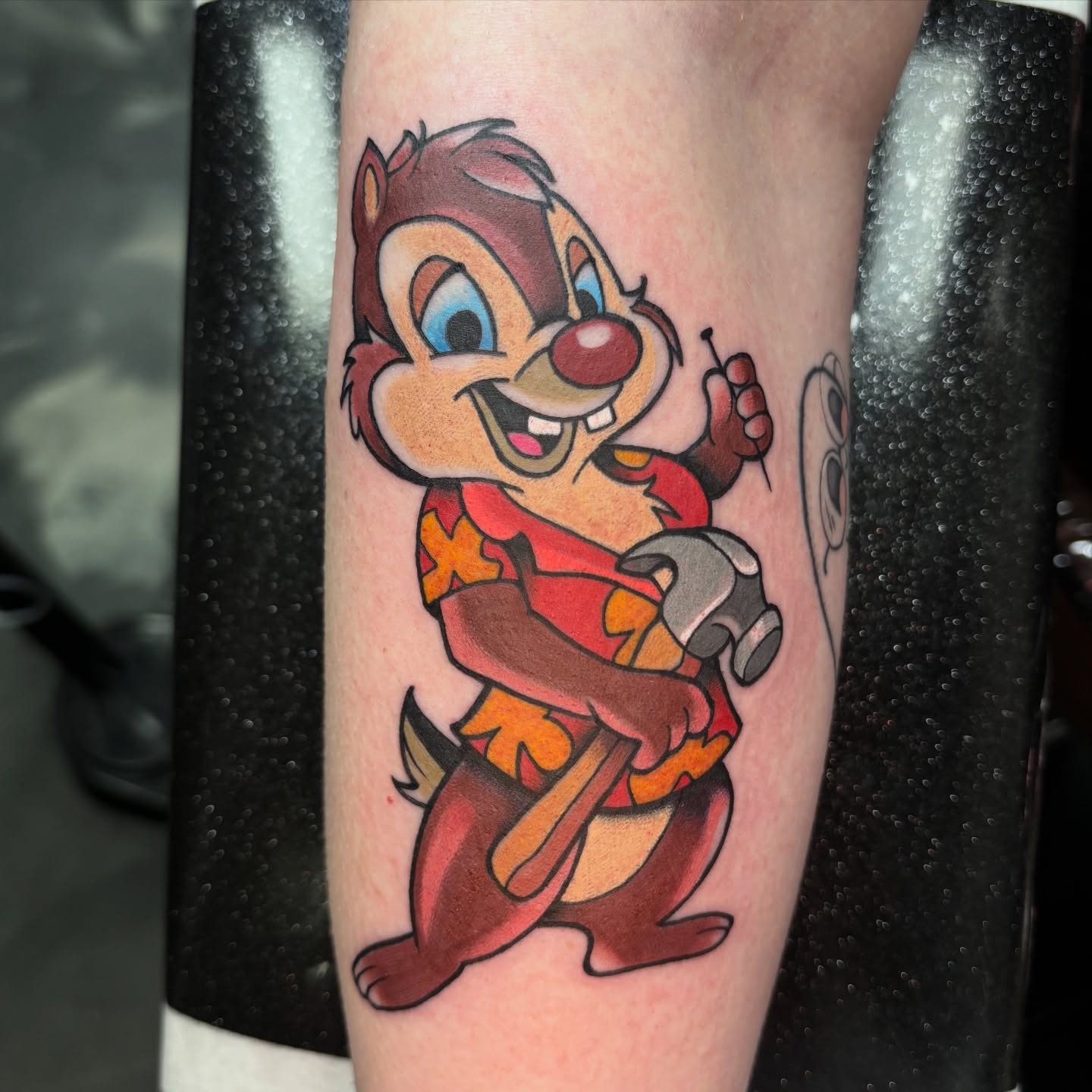 Chipmunk with hammer illustrative tattoo on the forearm by @koma_tk