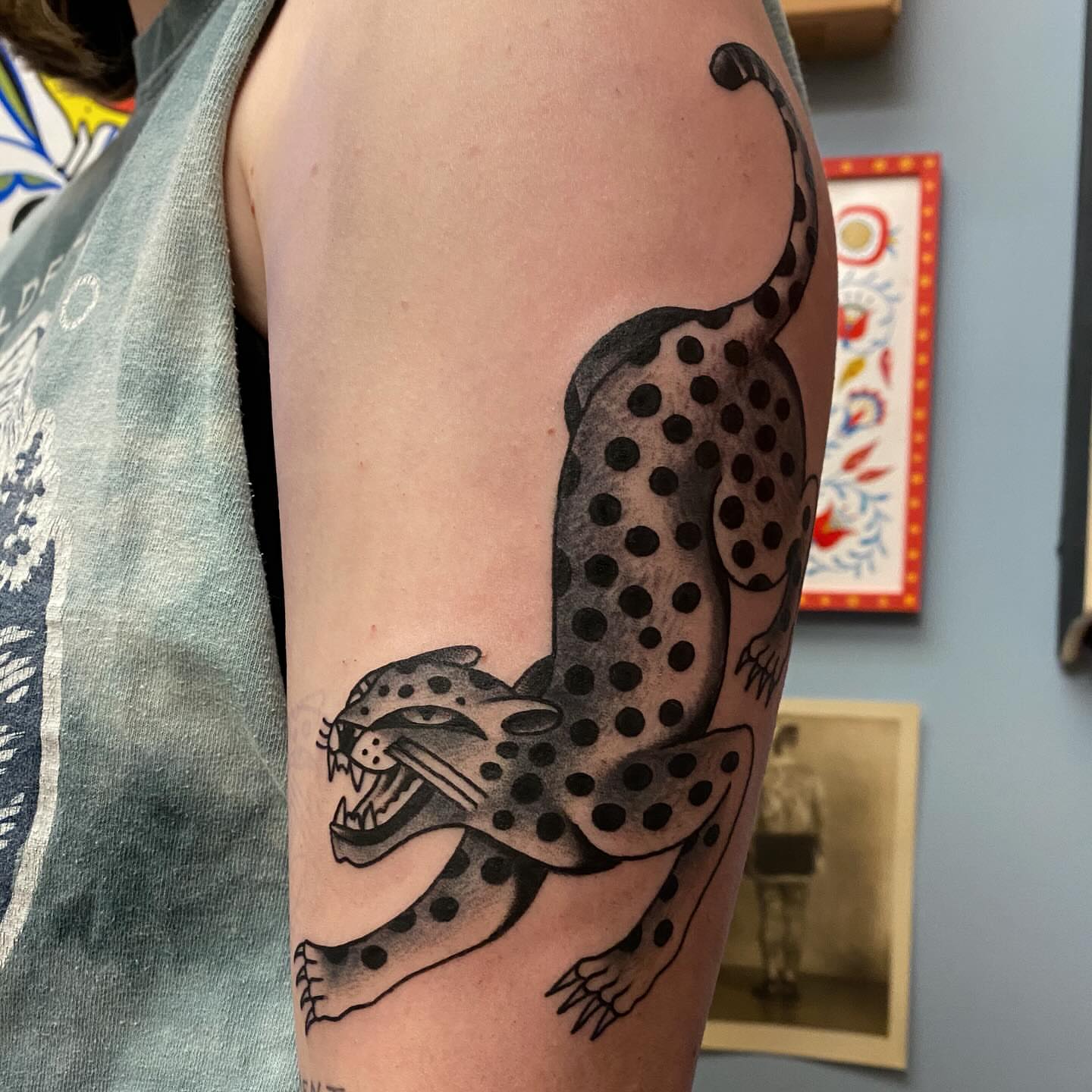 Cheetah black and grey tattoo on the forearm by Abby Rose Estes