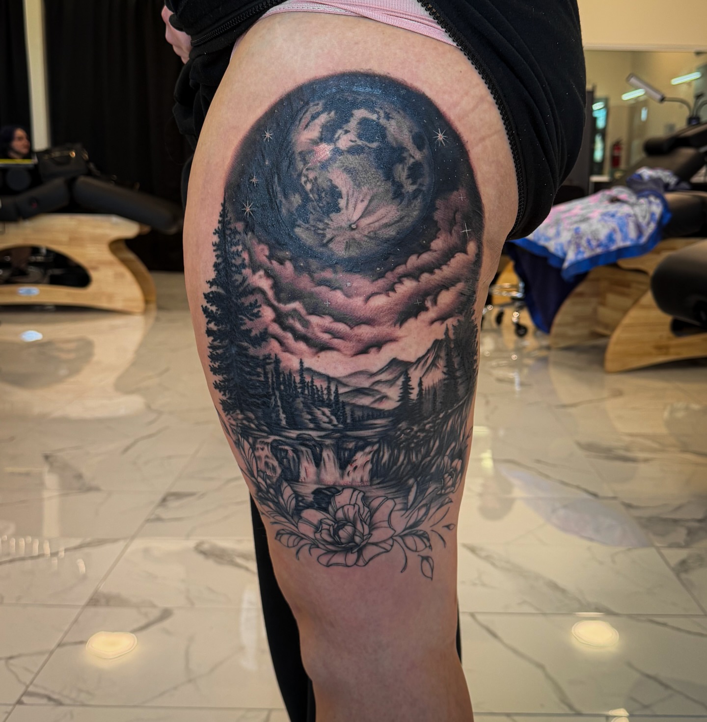 Night sky and forest realism tattoo on the thigh by utah tattoo artist