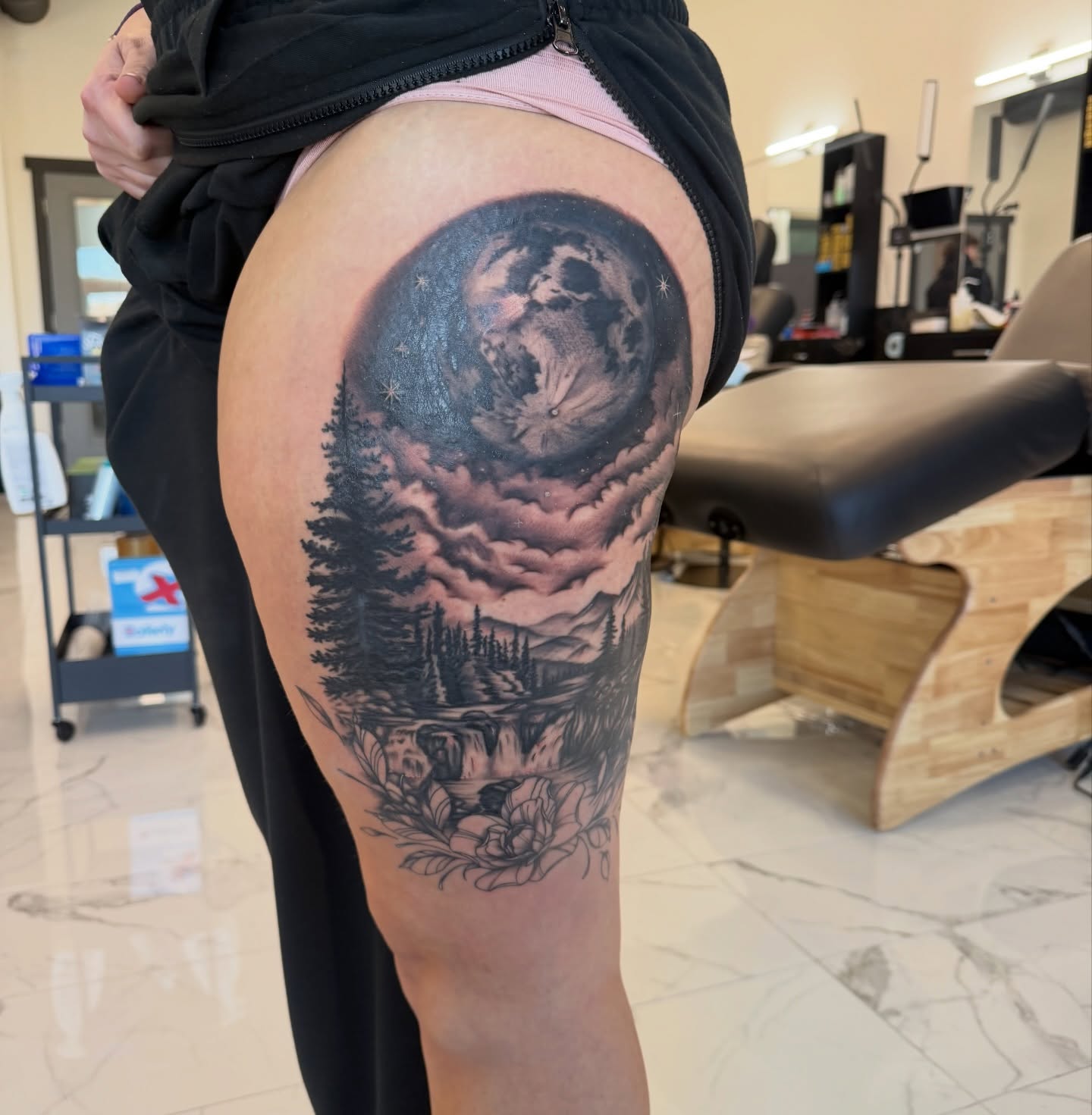Moonlit landscape realism tattoo on the thigh by utah tattoo artist