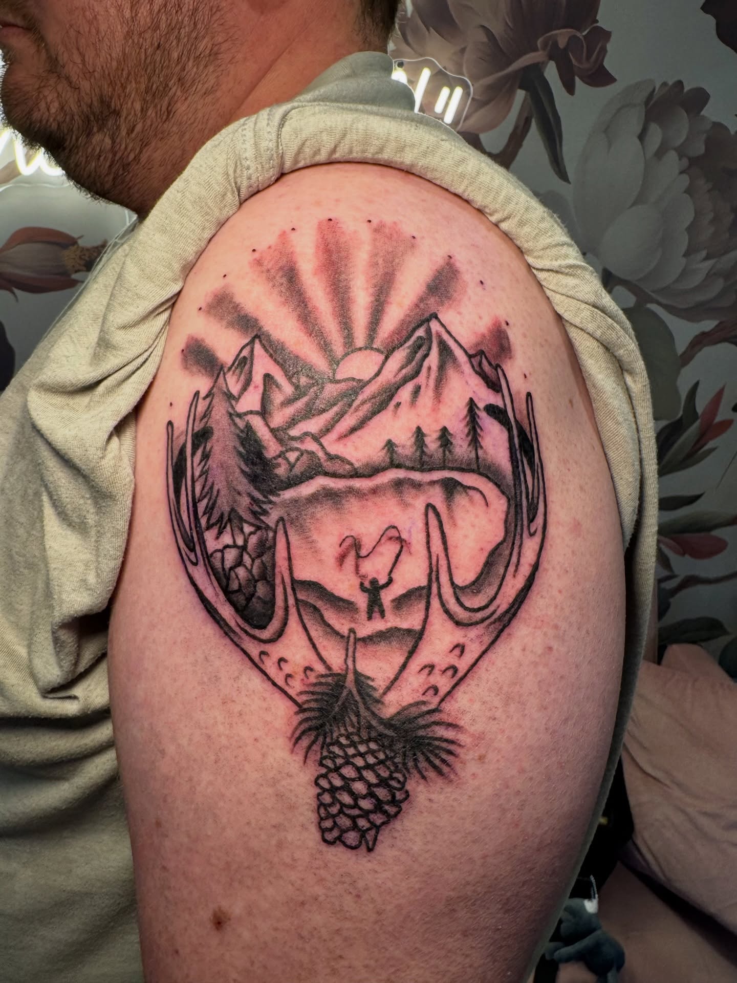 Mountain landscape black and grey tattoo on the shoulder by Kinzi Brown