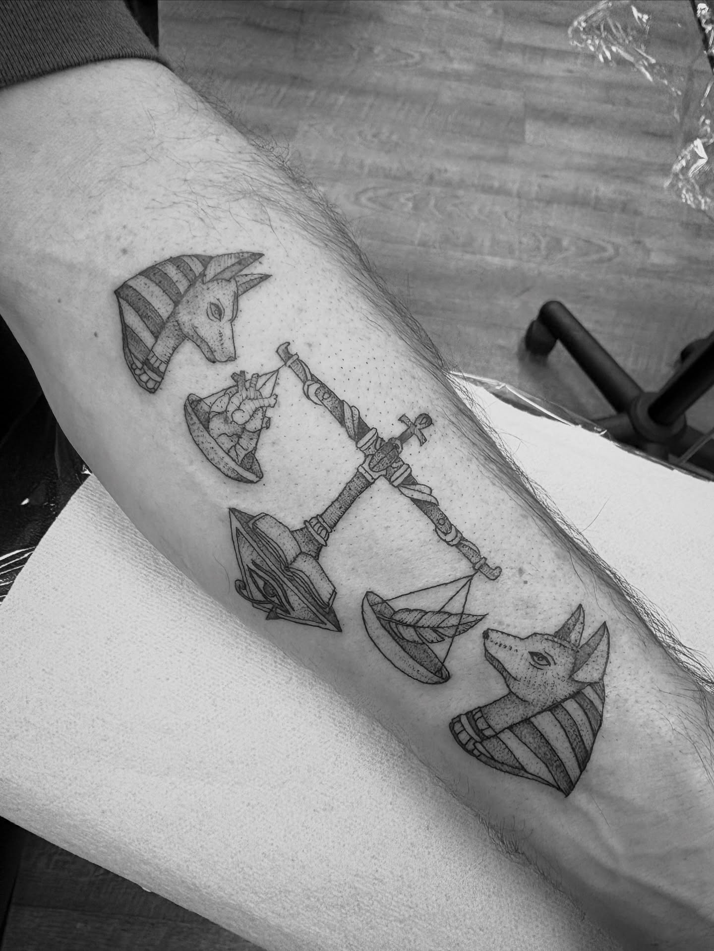 Zodiac symbols black and grey tattoo on the forearm by Jason Allen, Avondale, Arizona