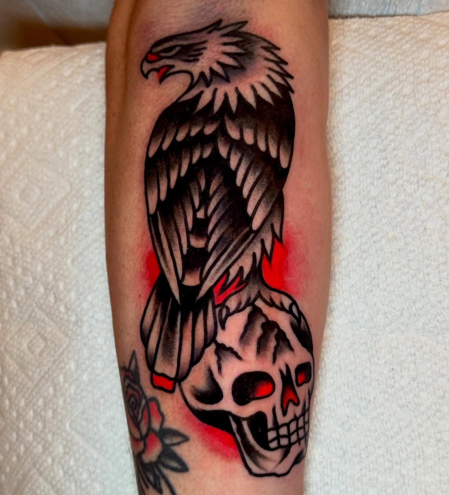 Eagle and skull American traditional tattoo on the forearm by Eli Bernal