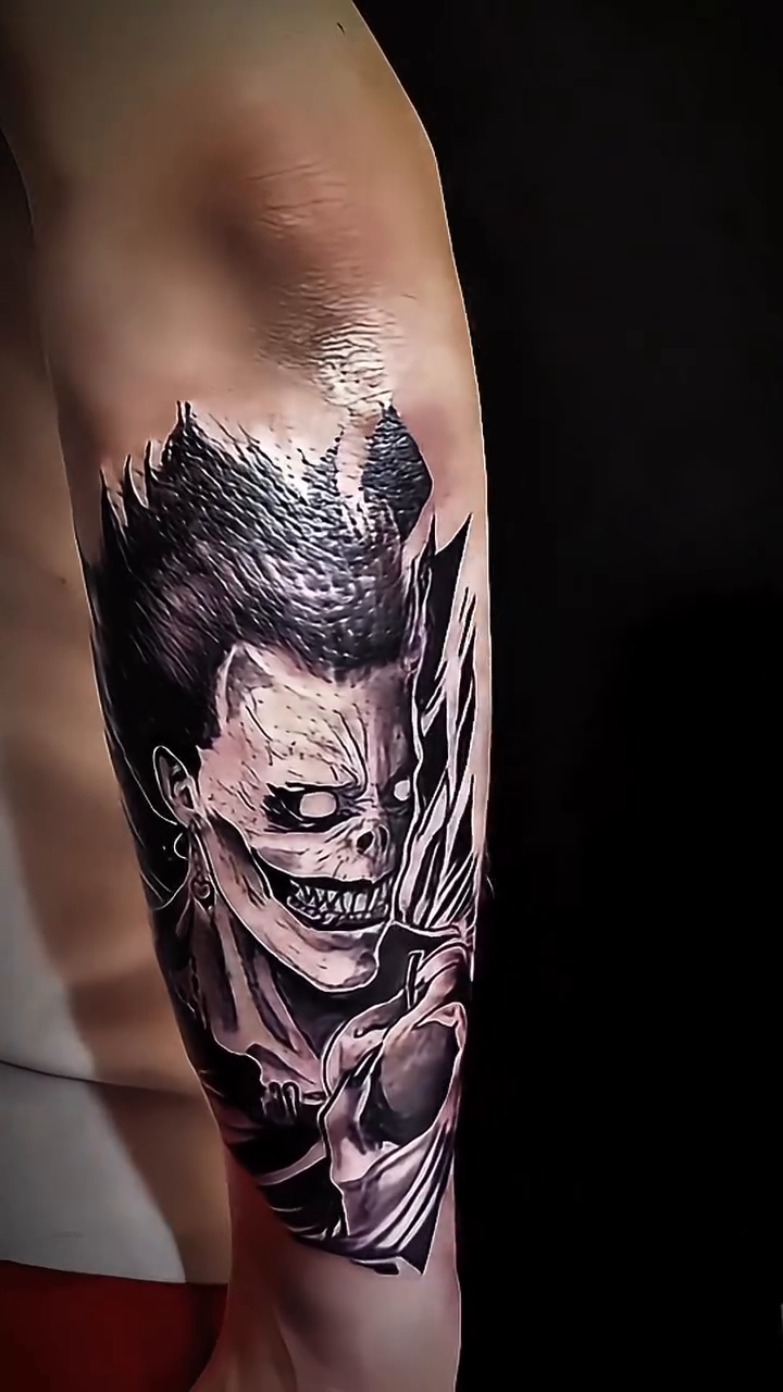Ryuk from Death Note anime tattoo on the forearm by K Valentine