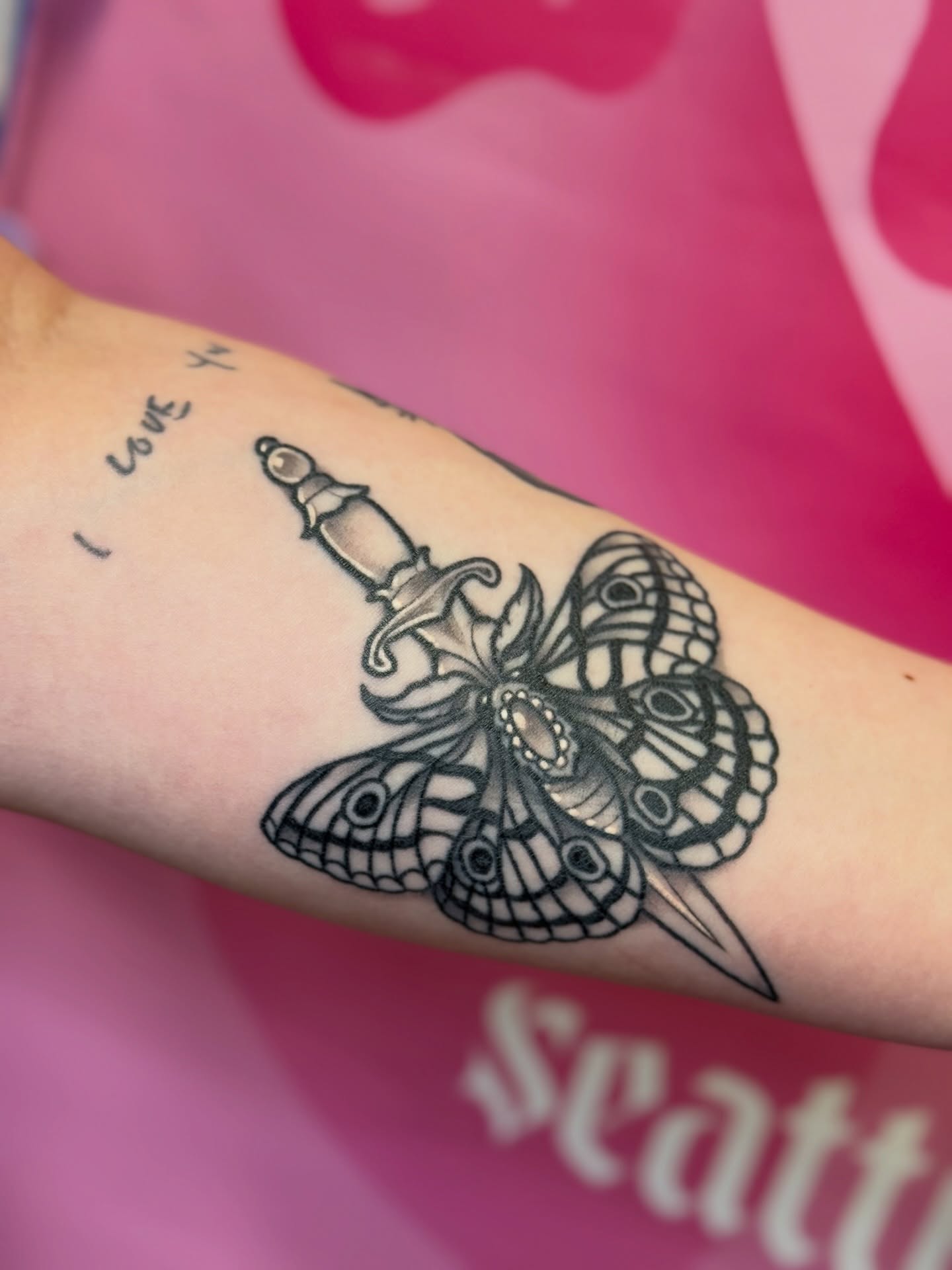 Butterfly black and grey tattoo on the forearm by Chelsea Graham, Seattle, Washington