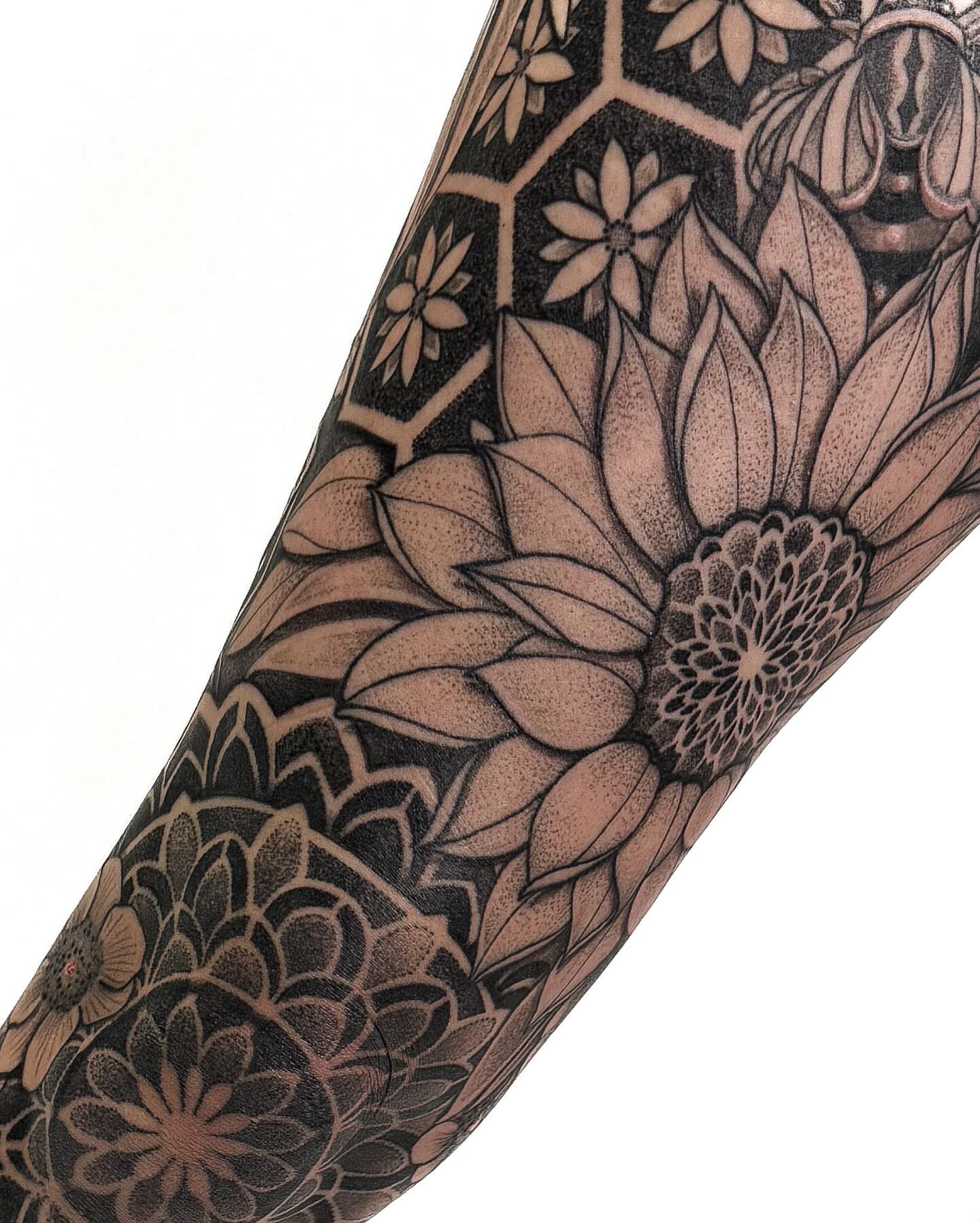 Floral bouquet geometric tattoo on the forearm by Jamie Beach, Wheat Ridge, Colorado