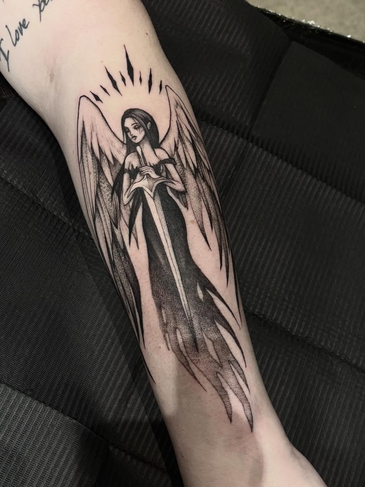 Angel black and grey tattoo on the forearm by ๐๐ช๐ฒ๐ต๐ฎ๐ ๐๐ช๐ฎ๐ฝ๐