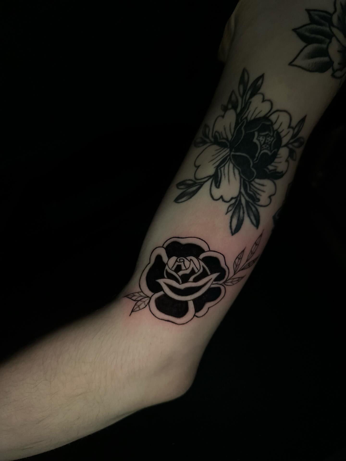 Rose black and grey tattoo on the forearm by Cherry Tats🍒
