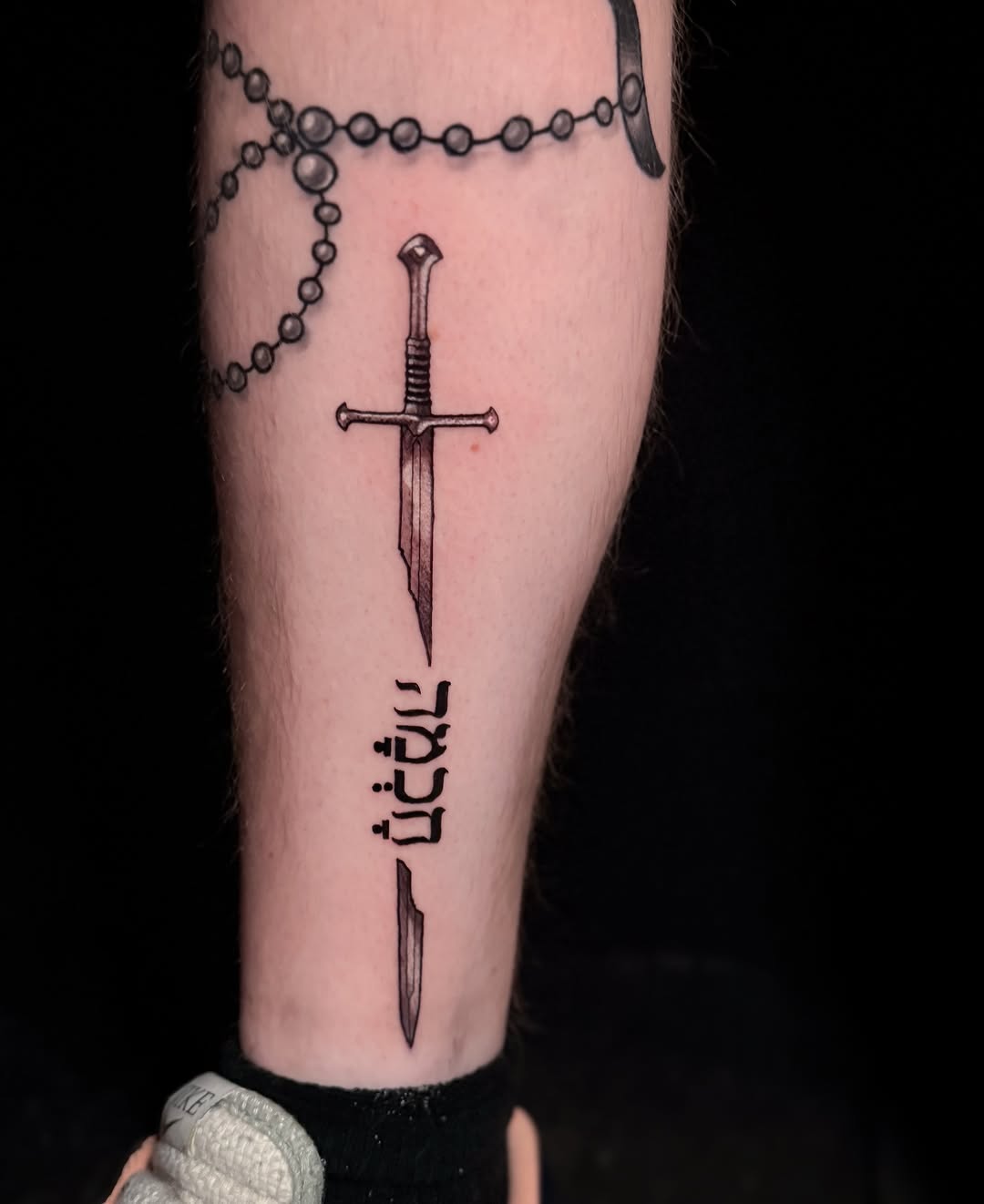Tattoo by @tyhamiltontattoos β black_and_grey, lettering_script