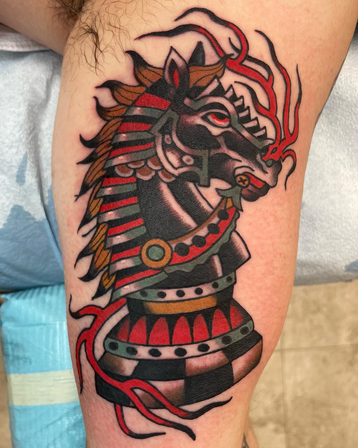 Horse helmet American traditional tattoo on the forearm by Gerald Bellmore