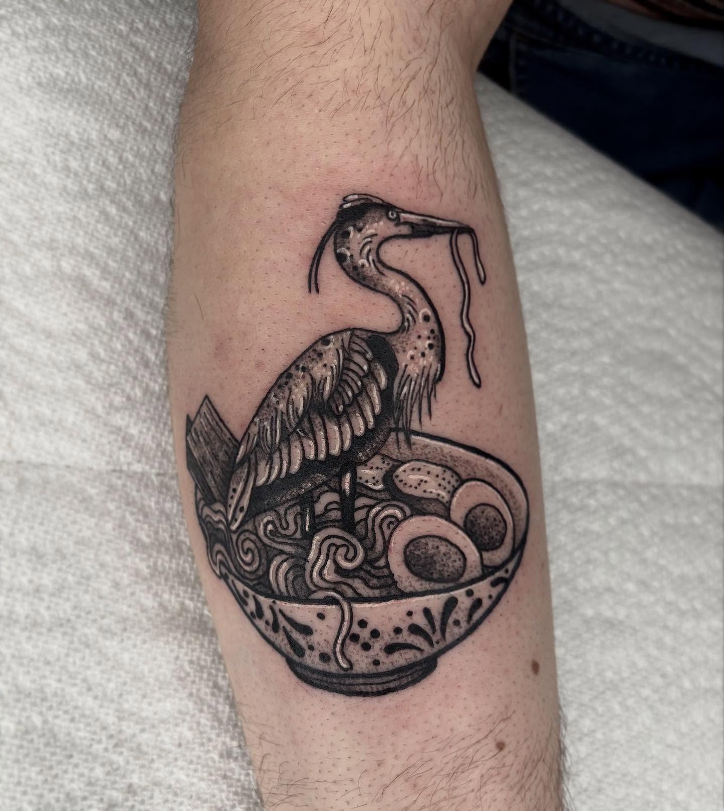 Heron and ramen dotwork tattoo on the forearm by destiney rose