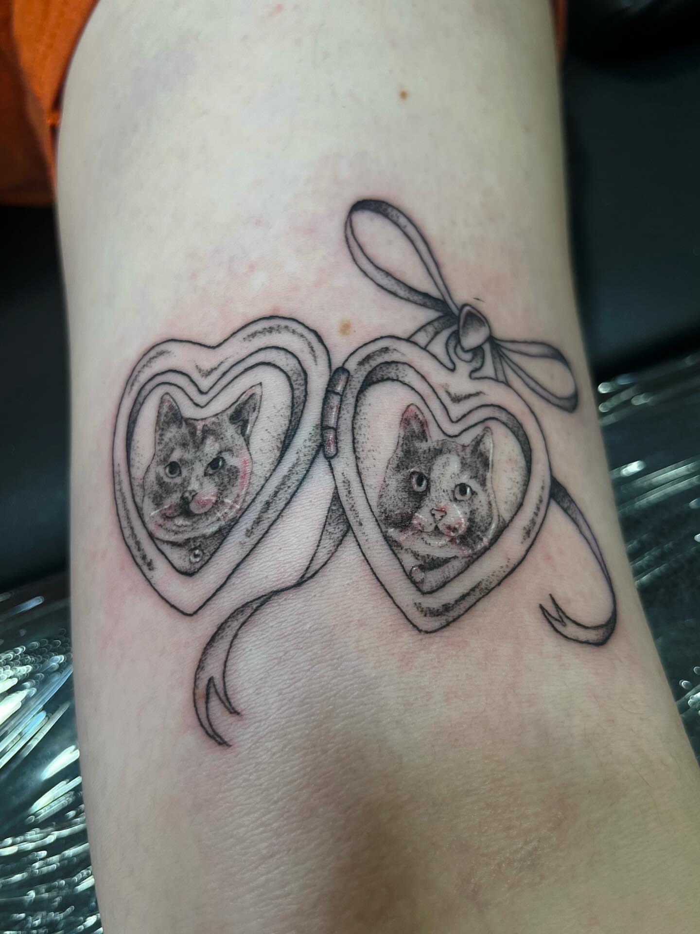 Cat in heart black and grey tattoo on the forearm by β
πΈππππ β