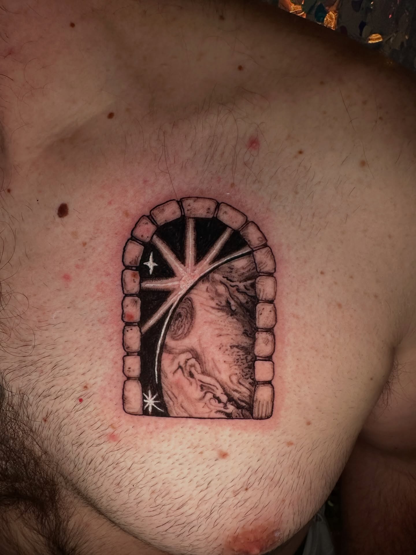 Astronaut in space realism tattoo on the chest by Sunny, Austin, Texas