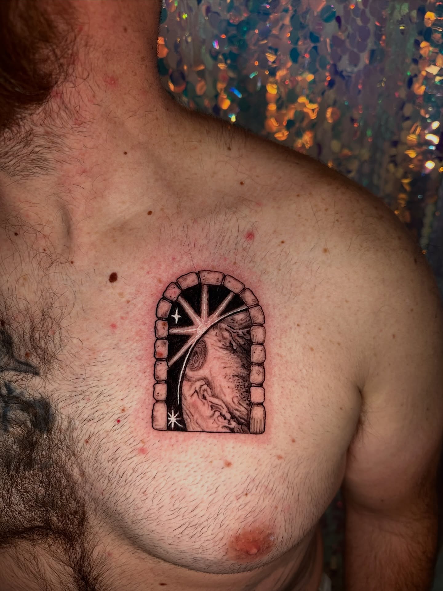 Astronaut in space realism tattoo on the chest by Sunny, Austin, Texas